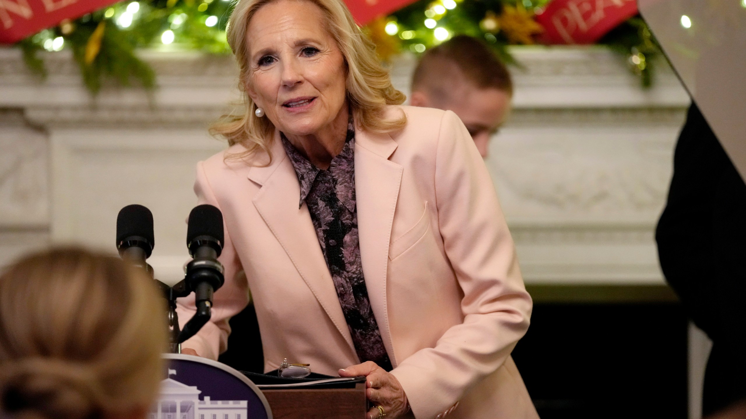 FILE - First lady Jill Biden comments on the pardon of Hunter Biden following an event with military families in the State Dining Room of the White House in Washington, Dec. 2, 2024. Jill Biden is departing Tuesday on her final solo foreign trip as first lady. It's a six-day, four-country haul through Italy, the United Arab Emirates, Qatar and France. It ends with her and President-elect Donald Trump joining other dignitaries in Paris on Saturday for the reopening of Notre Dame cathedral. (AP Photo/Susan Walsh, File)