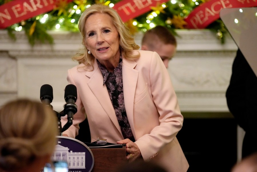 FILE - First lady Jill Biden comments on the pardon of Hunter Biden following an event with military families in the State Dining Room of the White House in Washington, Dec. 2, 2024. Jill Biden is departing Tuesday on her final solo foreign trip as first lady. It's a six-day, four-country haul through Italy, the United Arab Emirates, Qatar and France. It ends with her and President-elect Donald Trump joining other dignitaries in Paris on Saturday for the reopening of Notre Dame cathedral. (AP Photo/Susan Walsh, File)