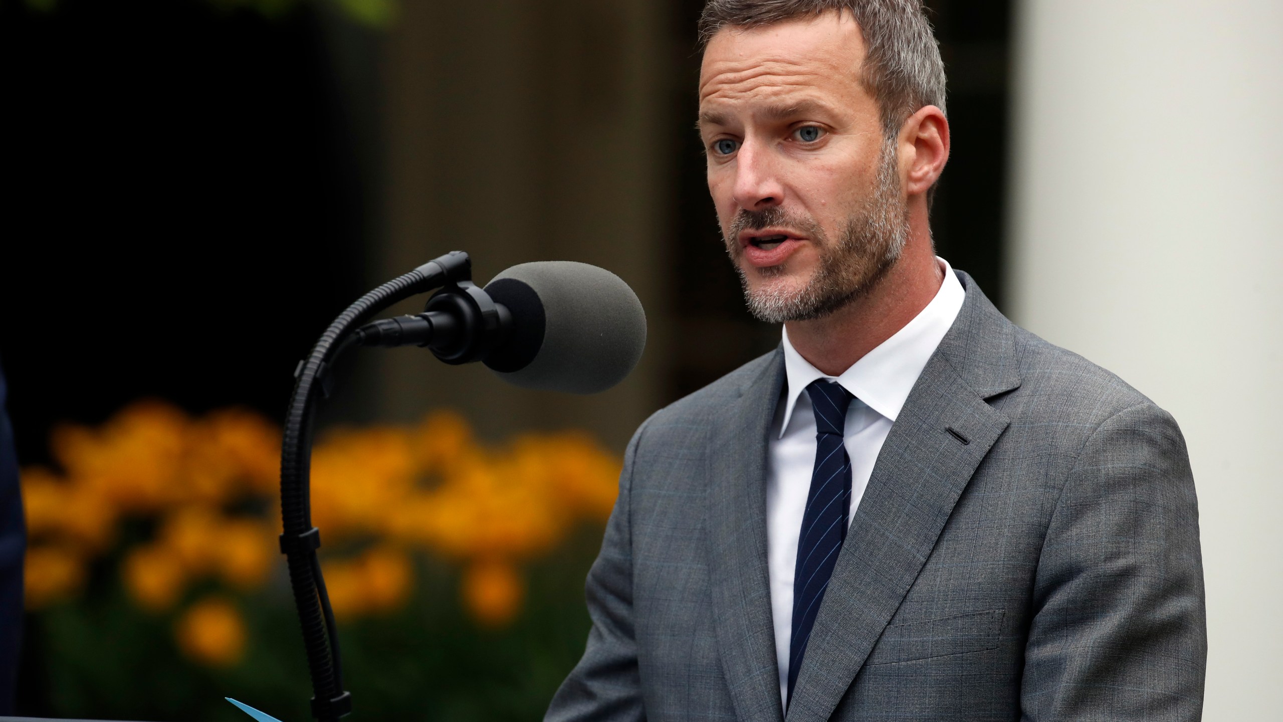 FILE - Adam Boehler, CEO of U.S. International Development Finance Corporation, speaks in the Rose Garden of the White House, April 14, 2020, in Washington. (AP Photo/Alex Brandon, File)