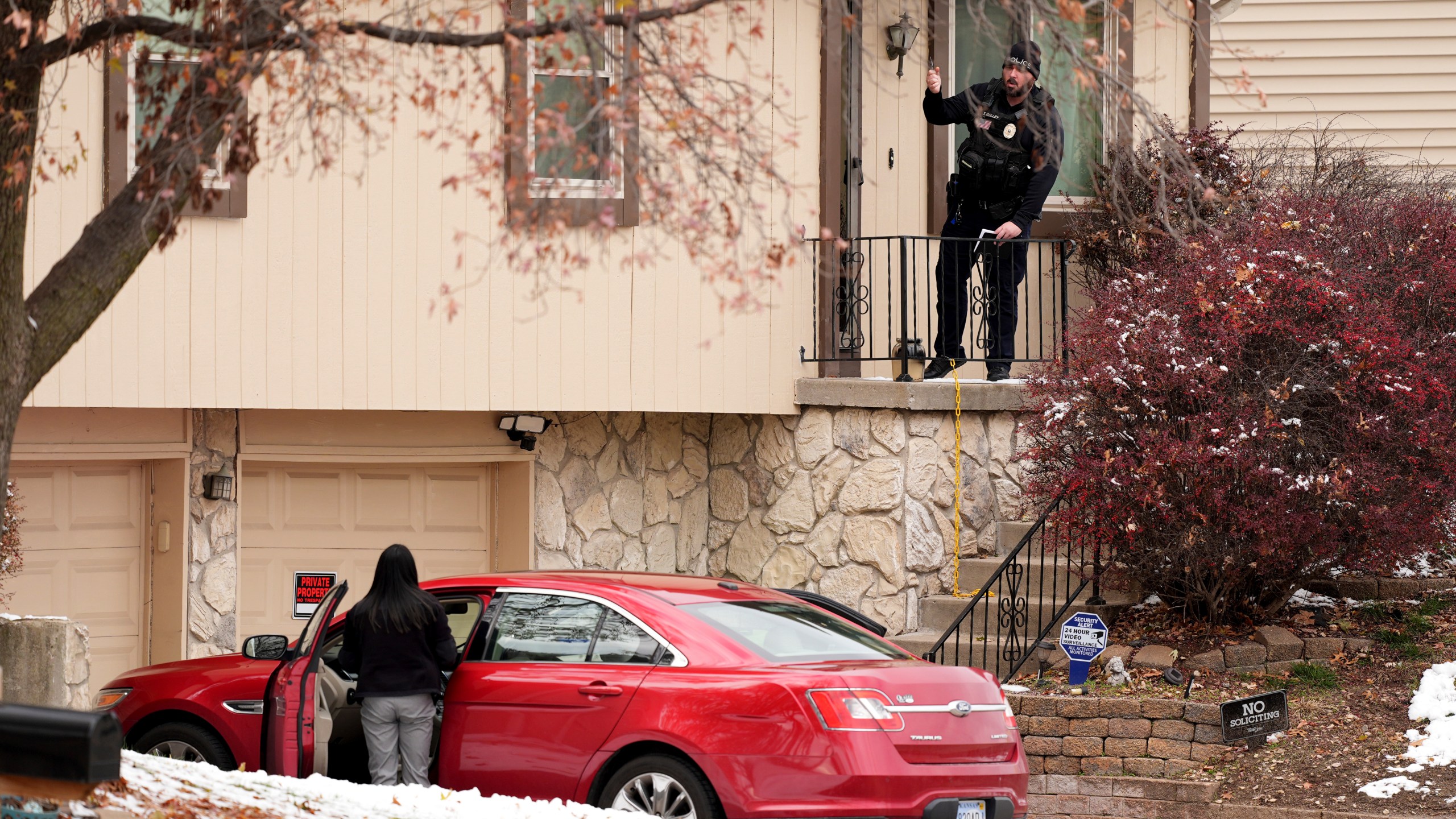 Police work the scene at the home of former police detective Roger Golubski on Monday, Dec. 2, 2024, in Edwardsville, Kan. (AP Photo/Charlie Riedel)