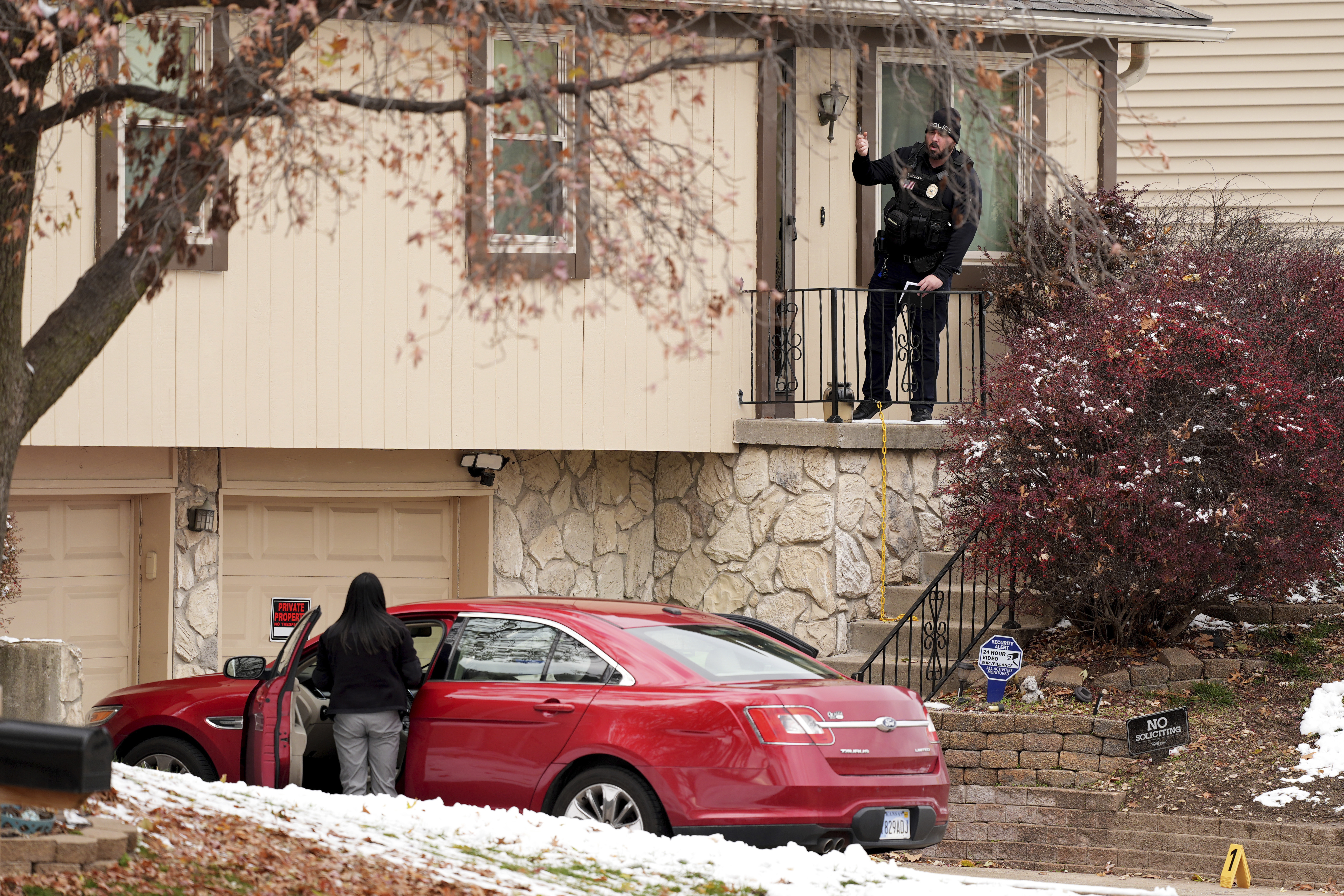 Police work the scene at the home of former police detective Roger Golubski on Monday, Dec. 2, 2024, in Edwardsville, Kan. (AP Photo/Charlie Riedel)