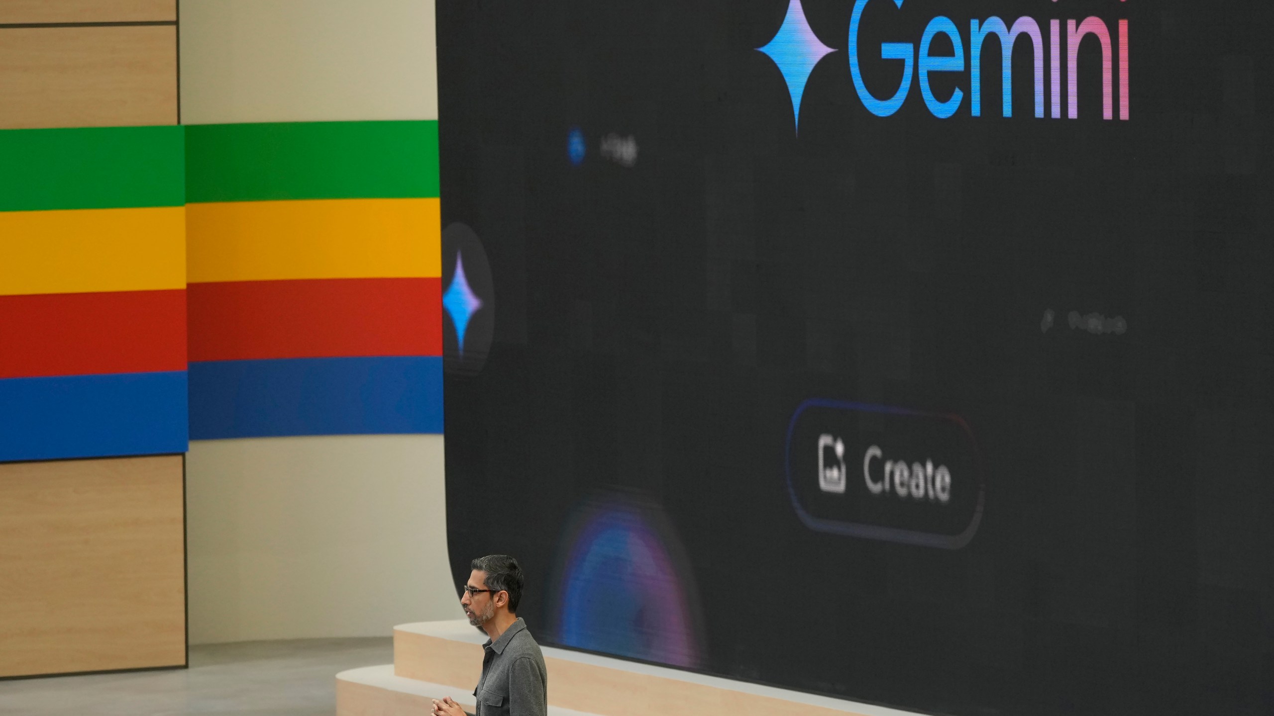 FILE - Alphabet CEO Sundar Pichai speaks about Gemini at a Google I/O event in Mountain View, Calif., May 14, 2024. (AP Photo/Jeff Chiu)