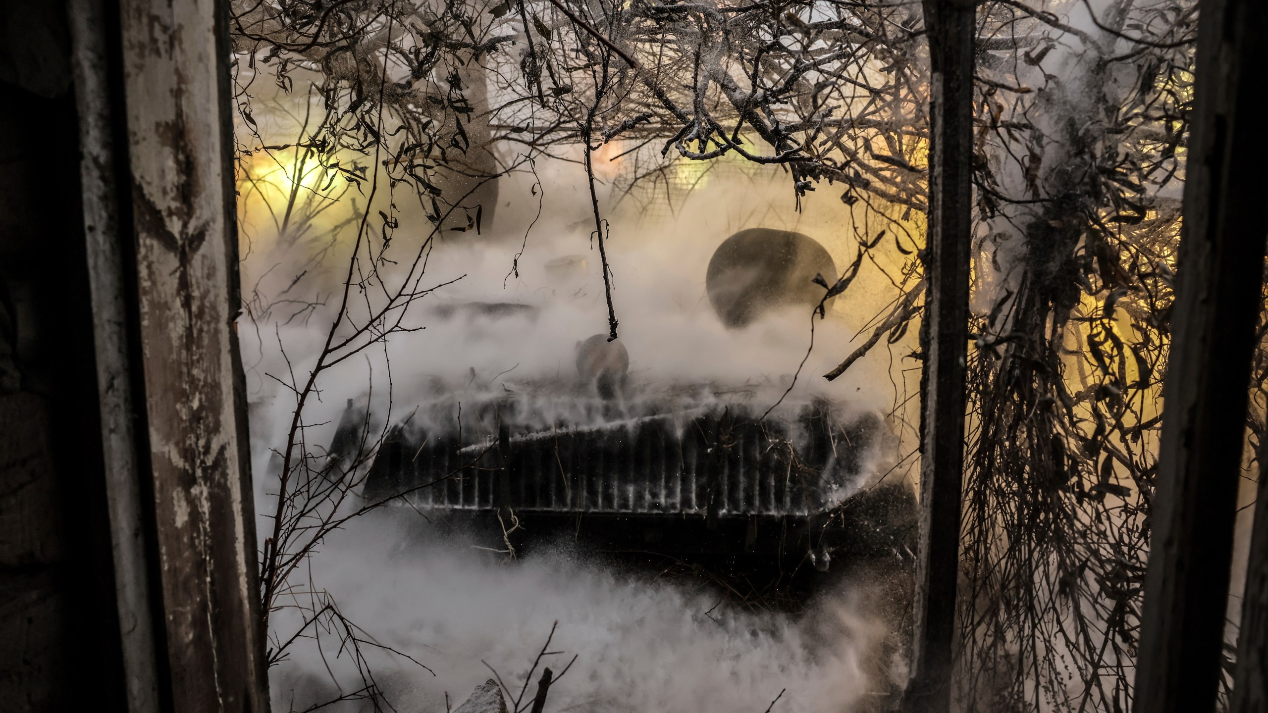 In this photo provided by Ukraine's 24th Mechanized Brigade press service, servicemen of the 24th Mechanised Brigade fire a 2s1 self-propelled 122mm howitzer towards Russian positions near Chasiv Yar town, in Donetsk region, Ukraine, Thursday, Dec. 12, 2024. (Oleg Petrasiuk/Ukrainian 24th Mechanised Brigade via AP)