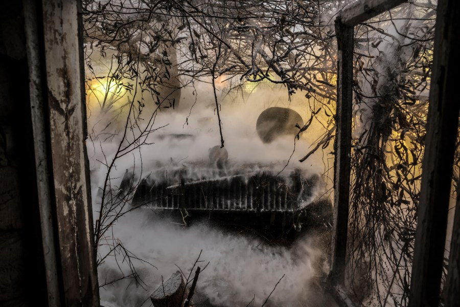 In this photo provided by Ukraine's 24th Mechanized Brigade press service, servicemen of the 24th Mechanised Brigade fire a 2s1 self-propelled 122mm howitzer towards Russian positions near Chasiv Yar town, in Donetsk region, Ukraine, Thursday, Dec. 12, 2024. (Oleg Petrasiuk/Ukrainian 24th Mechanised Brigade via AP)