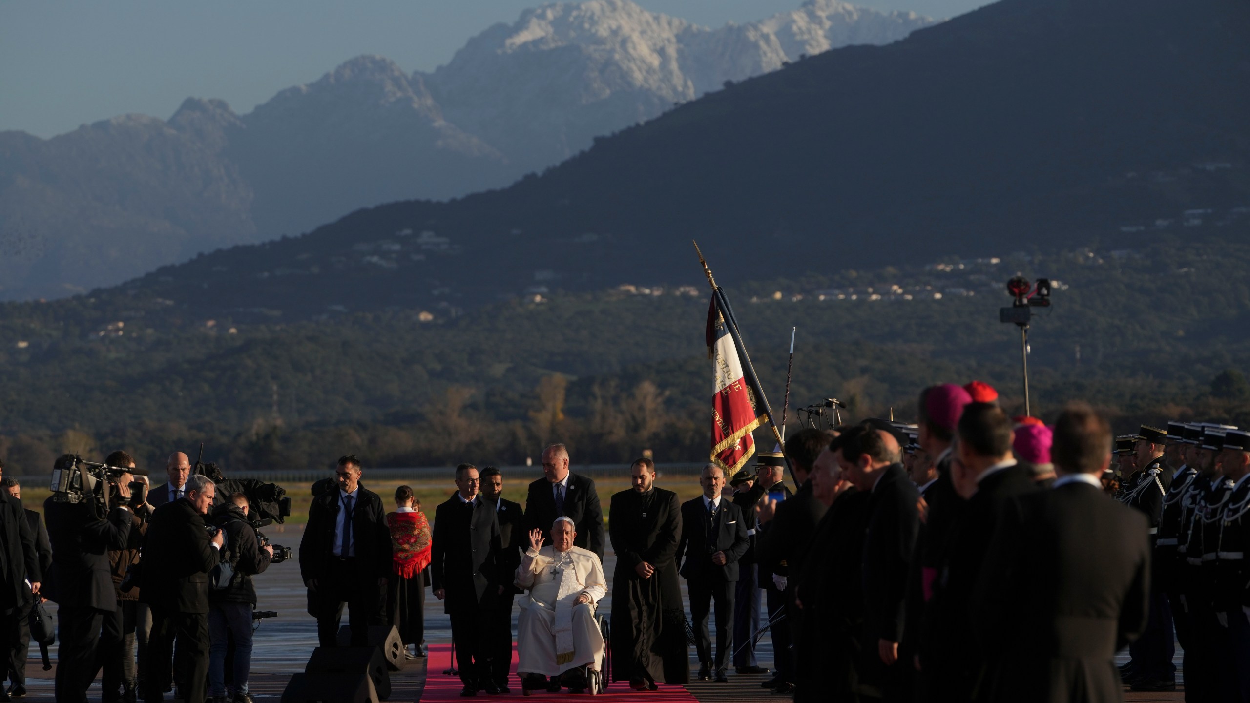 Pope Francis arrives at Ajaccio International Airport on the occasion of his one-day visit in the French island of Corsica, Sunday, Dec. 15, 2024. (AP Photo/Alessandra Tarantino)