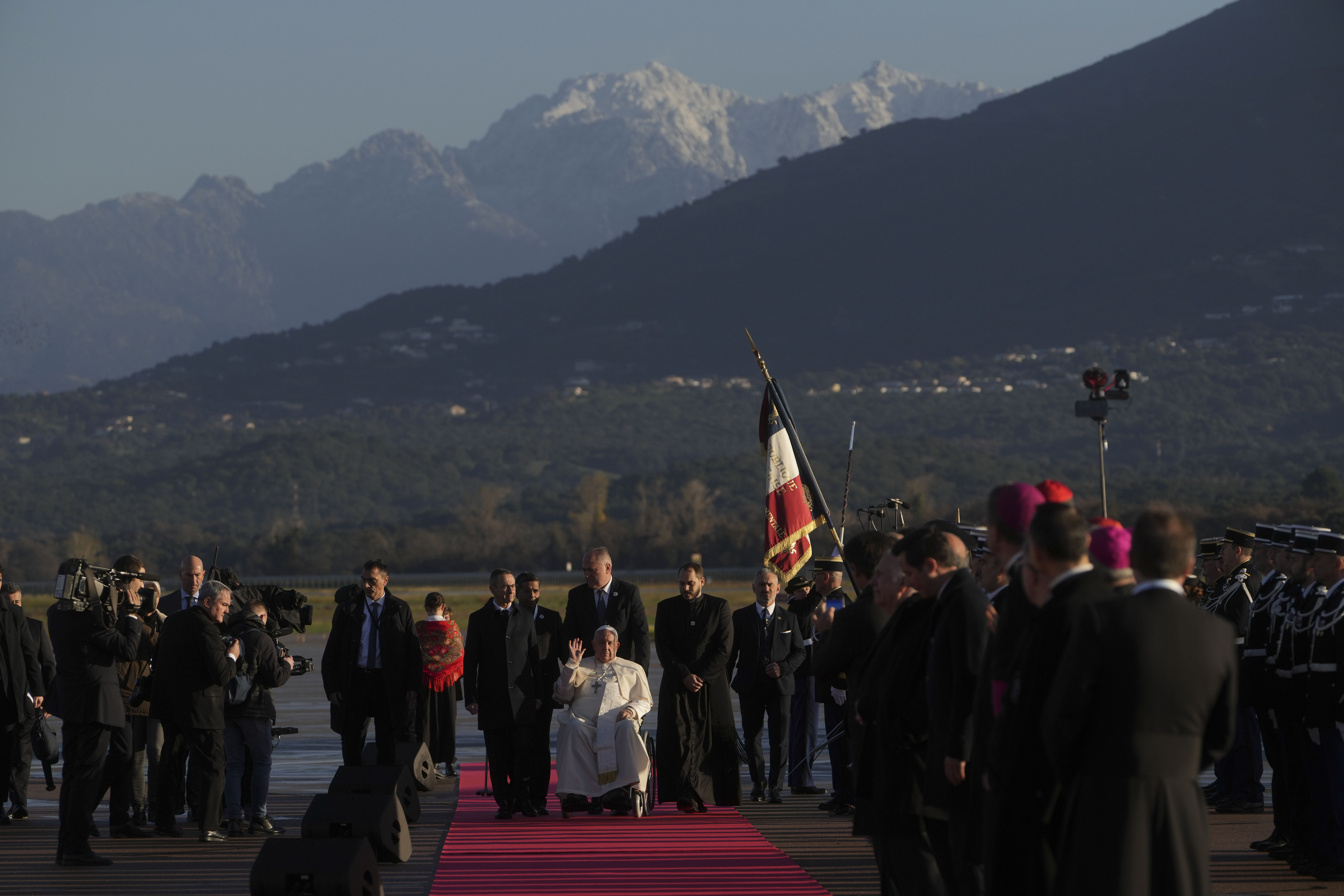 Pope Francis arrives at Ajaccio International Airport on the occasion of his one-day visit in the French island of Corsica, Sunday, Dec. 15, 2024. (AP Photo/Alessandra Tarantino)