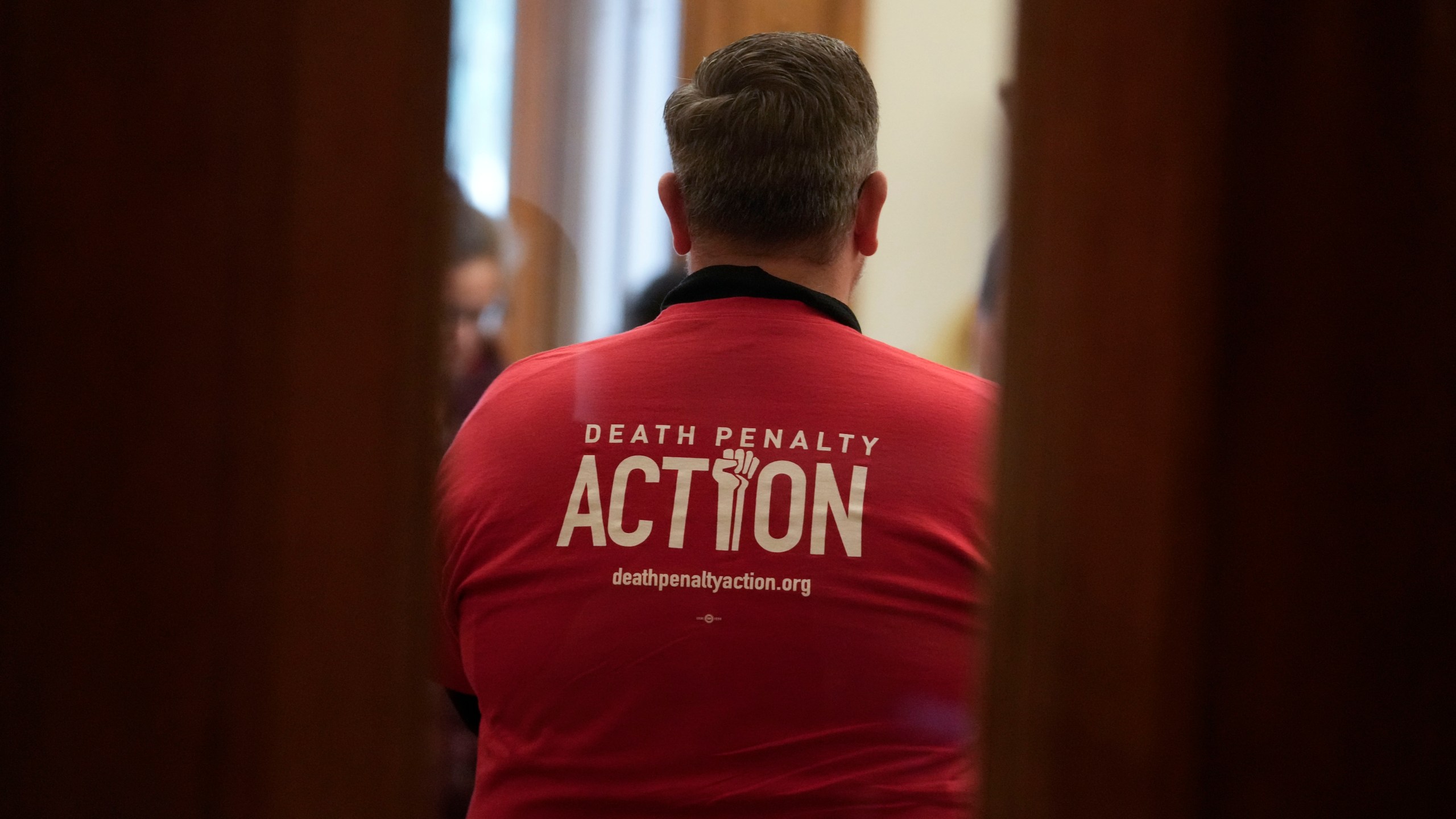 Bob Henry stands in the governor's office during a gathering of the Indiana Abolition Coalition at the Statehouse, Thursday, Dec. 12, 2024, in Indianapolis. (AP Photo/Darron Cummings)