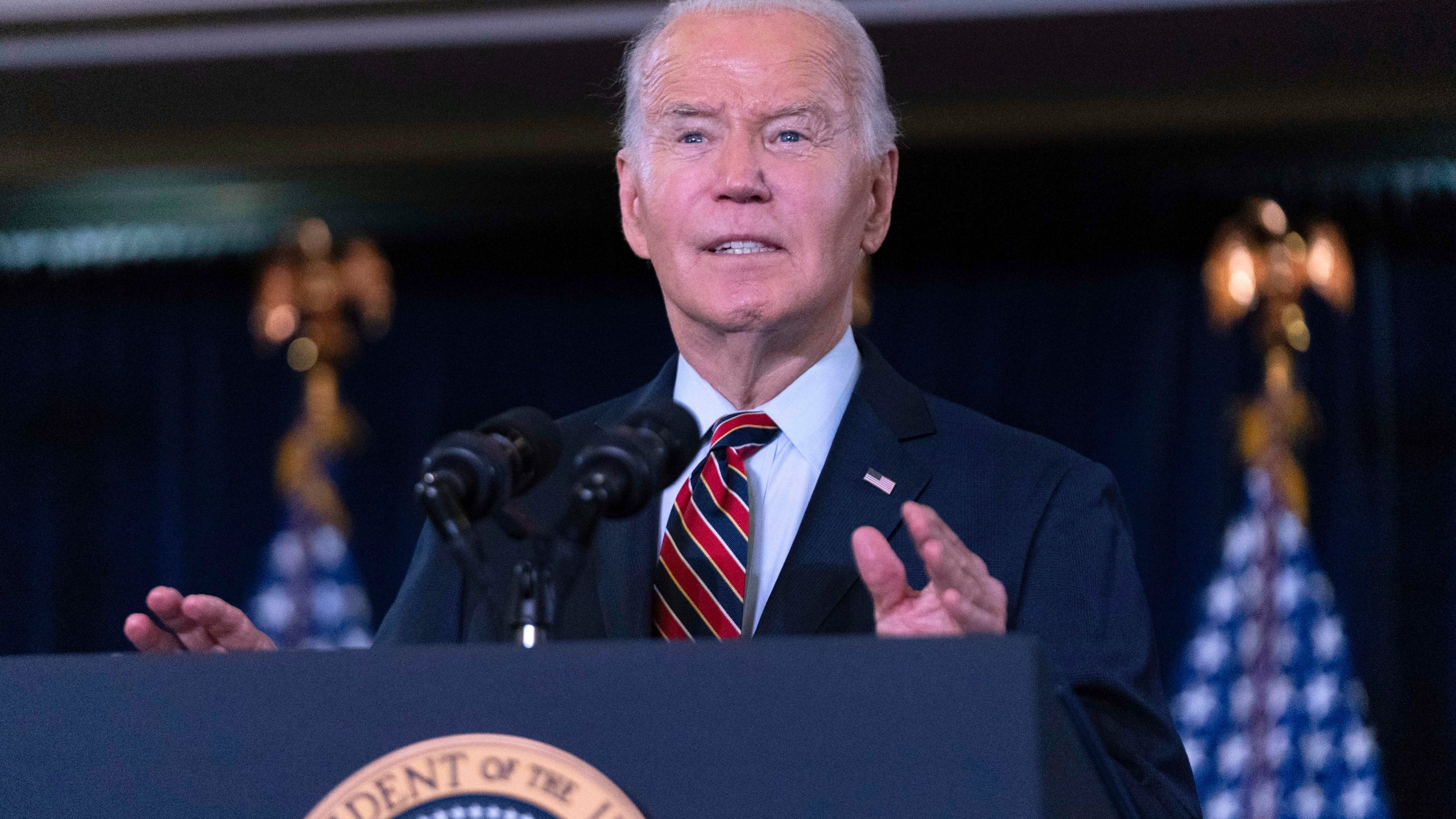 President Joe Biden delivers his remarks at the Democratic National Committee's Holiday Reception at Willard Hotel in Washington, Sunday, Dec. 15, 2024. (AP Photo/Jose Luis Magana)