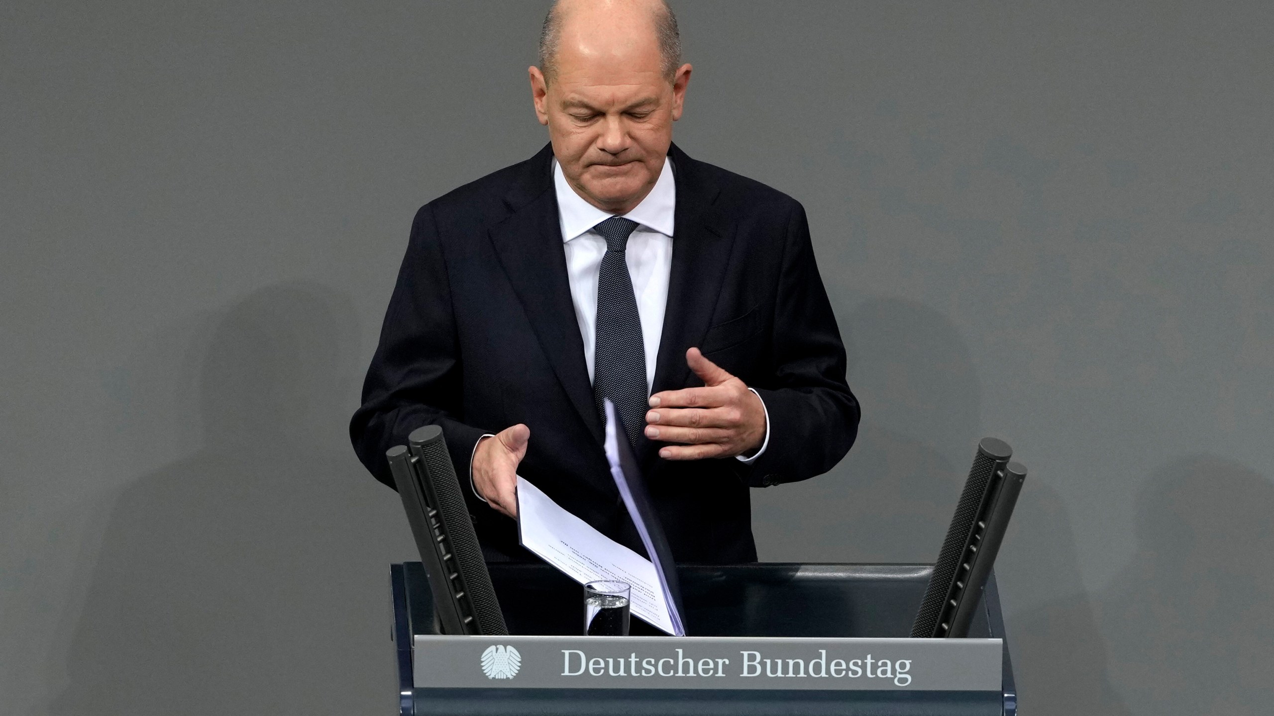 German Chancellor Olaf Scholz speaks during a plenary session at the German parliament Bundestag where he faces a vote of confidence, Berlin, Germany, Monday, Dec. 16, 2024. (AP Photo/Markus Schreiber)