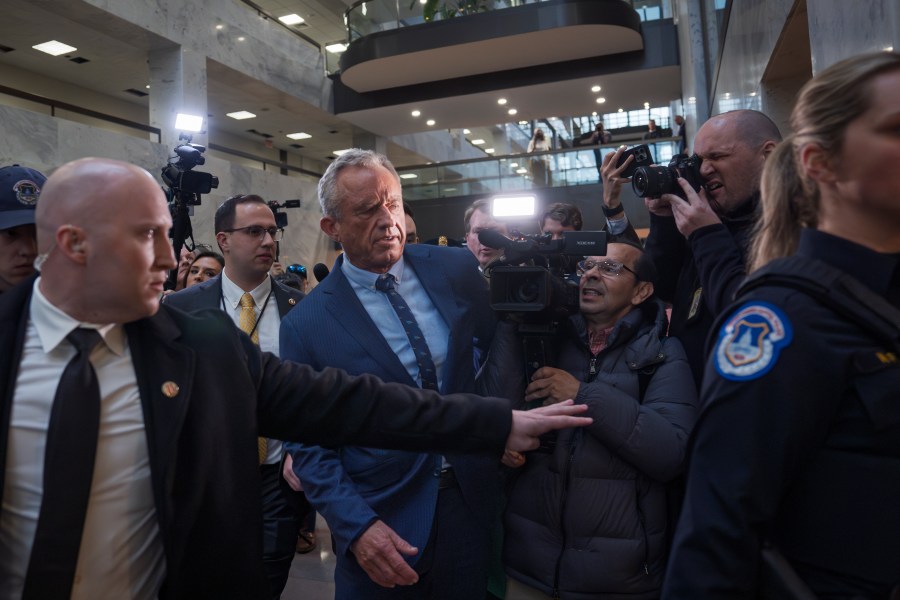 Robert F. Kennedy Jr., President-elect Donald Trump's nominee to be Secretary of Health and Human Services, arrives at the Hart Building to meet with senators at the Capitol in Washington, Monday, Dec. 16, 2024. (AP Photo/J. Scott Applewhite)