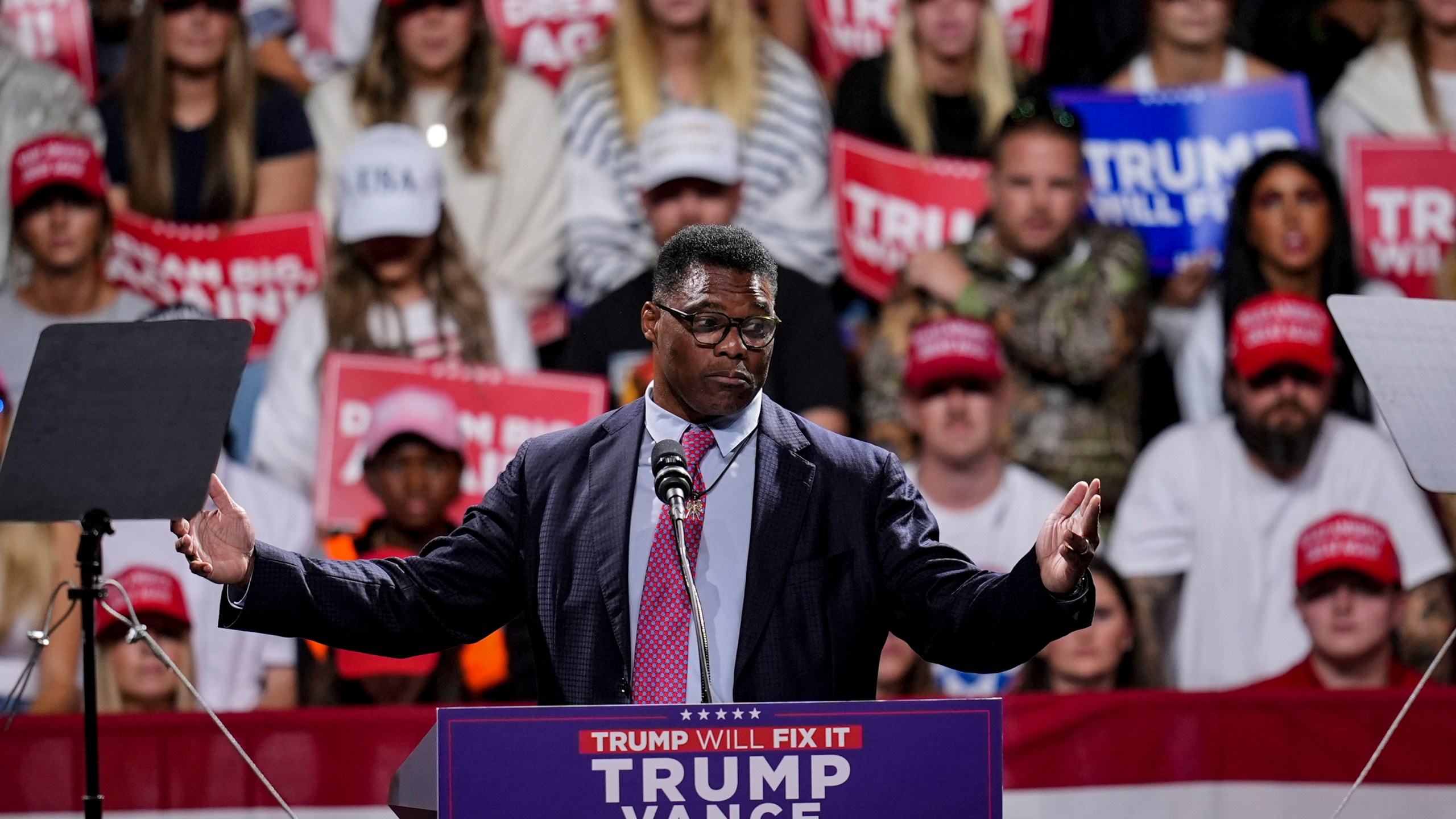 FILE - Herschel Walker speaks during a campaign rally at Atrium Health Amphitheater for Republican presidential nominee former President Donald Trump, Nov. 3, 2024, in Macon, Ga. (AP Photo/Mike Stewart)