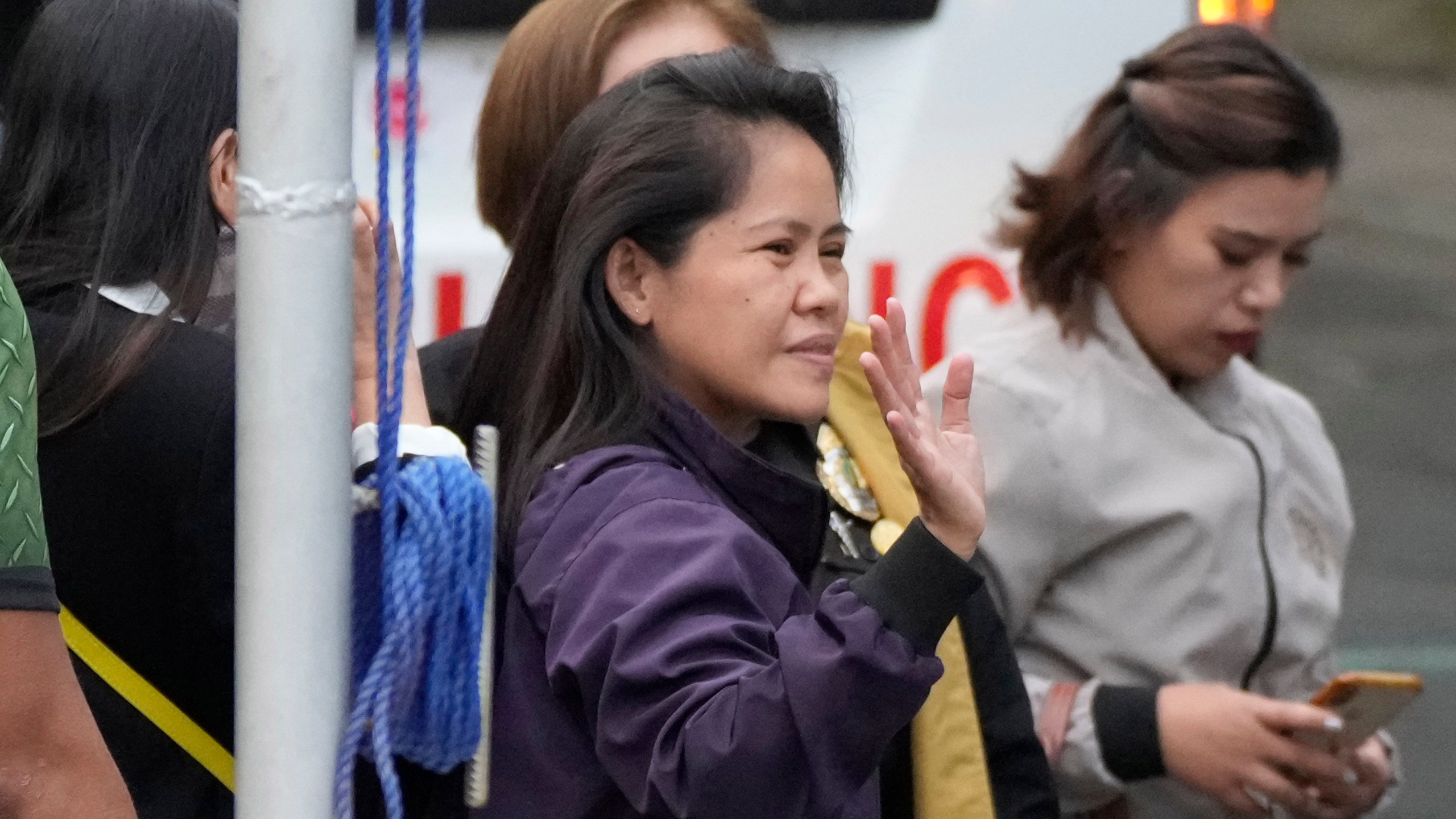 Mary Jane Veloso, a Filipino woman who spent almost 15 years in an Indonesian prison for drug trafficking and was nearly executed by firing squad in 2015, arrives at the Correctional Institution for Women in Mandaluyong, Philippines, Wednesday, Dec. 18, 2024. (AP Photo/Aaron Favila)