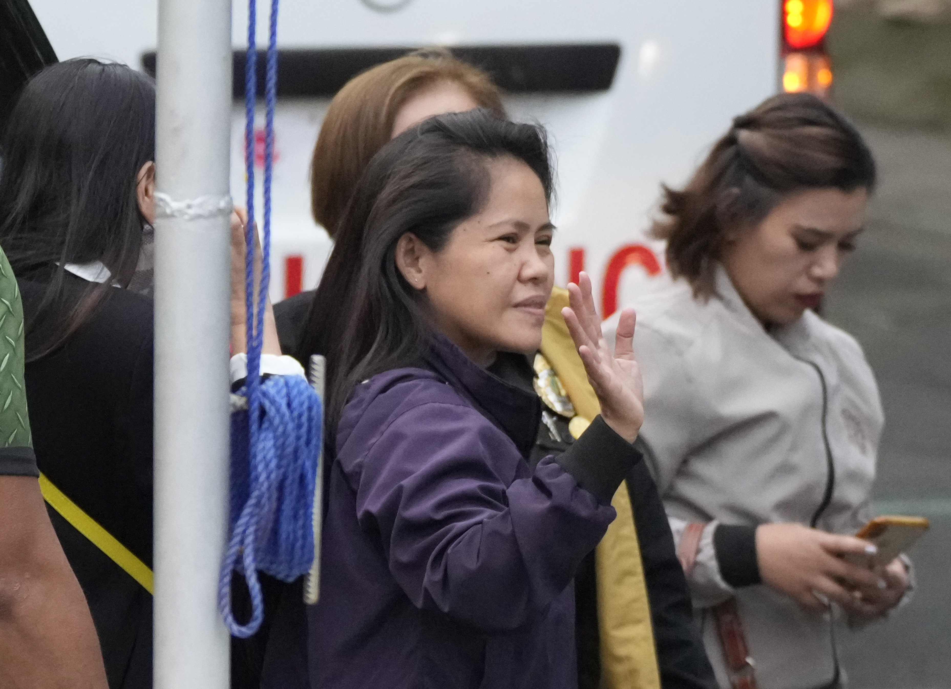 Mary Jane Veloso, a Filipino woman who spent almost 15 years in an Indonesian prison for drug trafficking and was nearly executed by firing squad in 2015, arrives at the Correctional Institution for Women in Mandaluyong, Philippines, Wednesday, Dec. 18, 2024. (AP Photo/Aaron Favila)