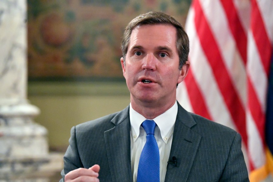 Kentucky Gov. Andy Beshear talks about the gains in the economic growth f the state during the past year in Frankfort, Ky., Wednesday, Dec. 18, 2024. (AP Photo/Timothy D. Easley)