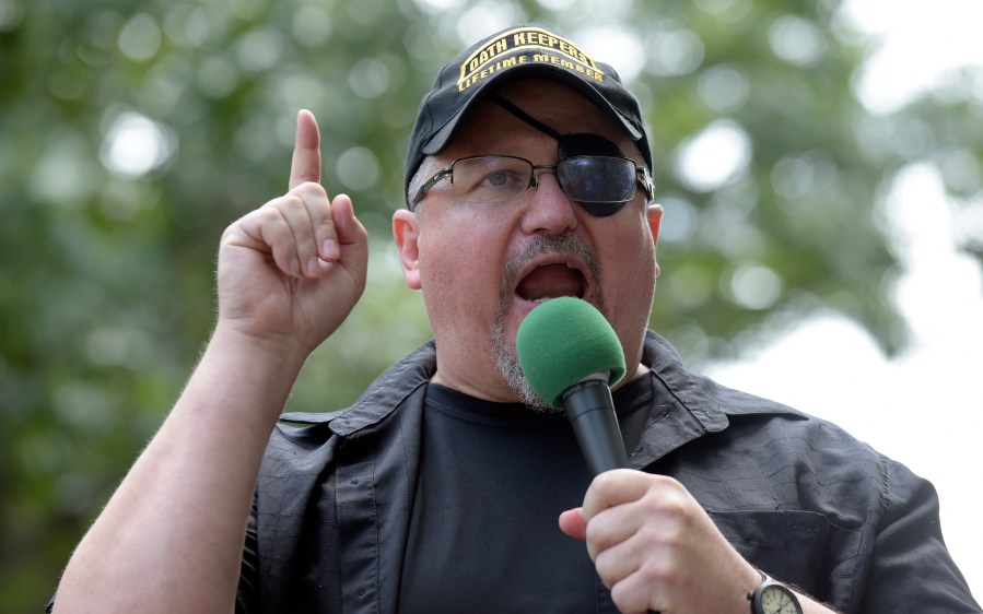 FILE - Stewart Rhodes, founder of the Oath Keepers, speaks during a rally outside the White House in Washington, June 25, 2017. (AP Photo/Susan Walsh, File)