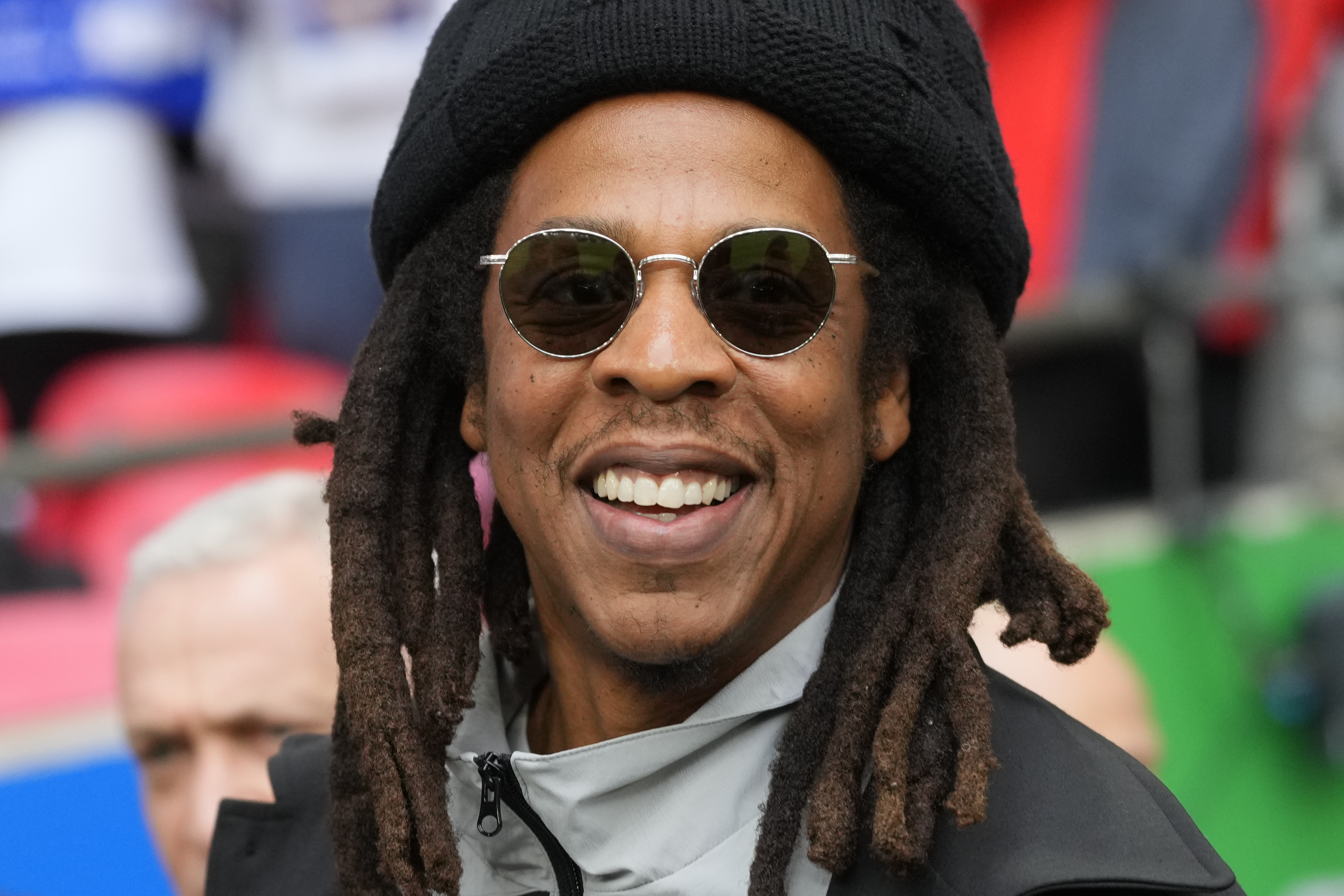 FILE - Jay-Z smiles ahead of the Champions League final soccer match between Borussia Dortmund and Real Madrid at Wembley stadium in London, June 1, 2024. (AP Photo/Kirsty Wigglesworth, File)