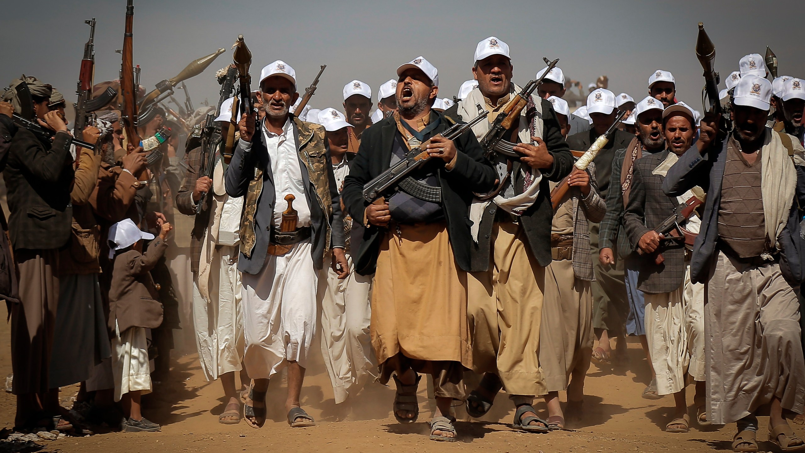 Houthi fighters march during a rally of support for the Palestinians in the Gaza Strip and against the U.S. strikes on Yemen outside Sanaa on Monday, Jan. 22, 2024. (AP Photo)