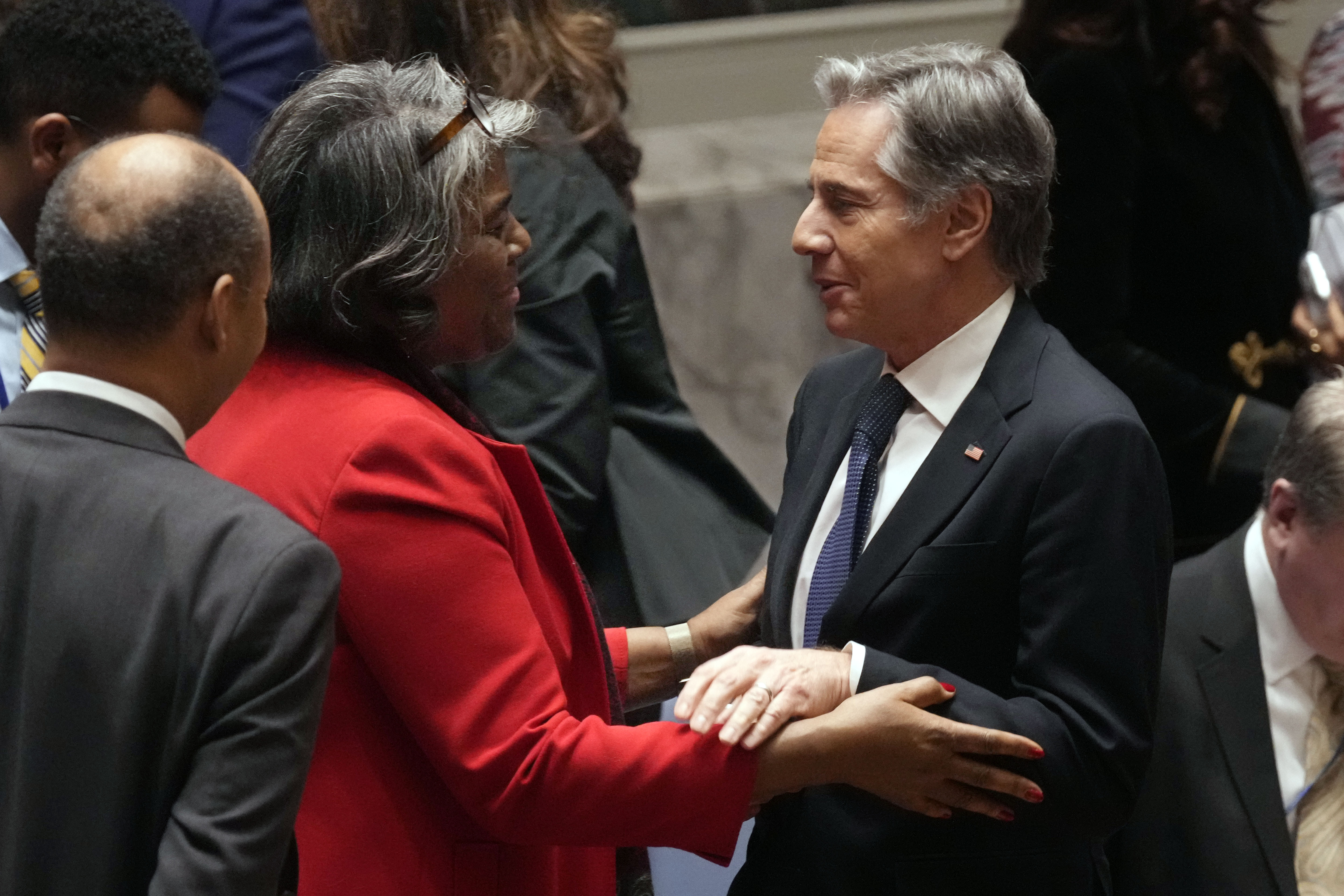 U.S. UN Ambassador Linda Thomas-Greenfield talks with US Secretary of State Antony Blinken after a meeting in the United Nations Security Council, Thursday, Dec. 19, 2024. (AP Photo/Richard Drew)