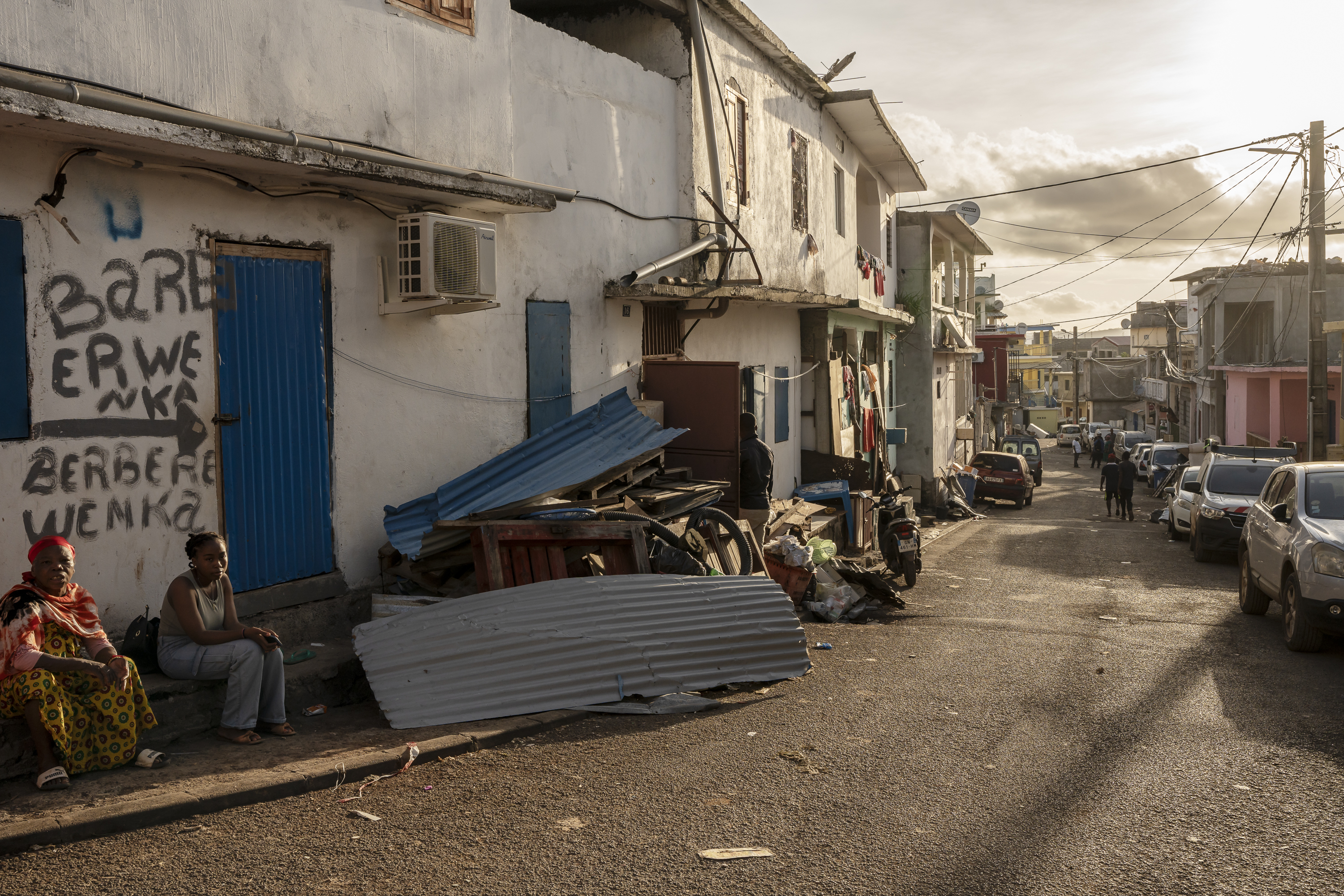 Cleared debris after Cyclone Chido are seen in the Kaweni slum on the outskirts of Mamoudzou, in the French Indian Ocean island of Mayotte, Thursday, Dec. 19, 2024. (AP Photo/Adrienne Surprenant)