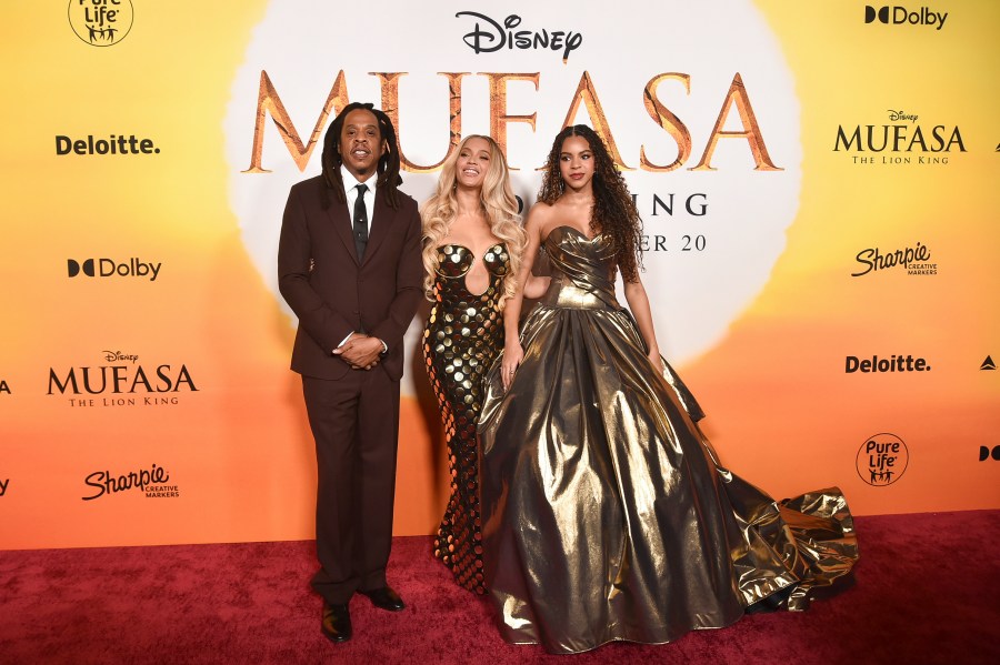 Jay-Z, from left, Beyoncé and Blue Ivy Carter arrive at the premiere of "Mufasa: The Lion King" on Monday, Dec. 9, 2024, at the Dolby Theatre in Los Angeles. (Photo by Richard Shotwell/Invision/AP)