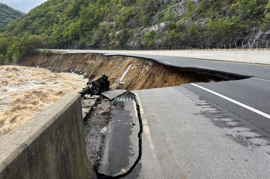 FILE - This photo provided by the North Carolina Department of Transportation shows the collapsed eastbound lane of I-40 into the Pigeon River in North Carolina near the Tennessee border, Sept. 28, 2024. (N.C. Department of Transportation via AP, File)