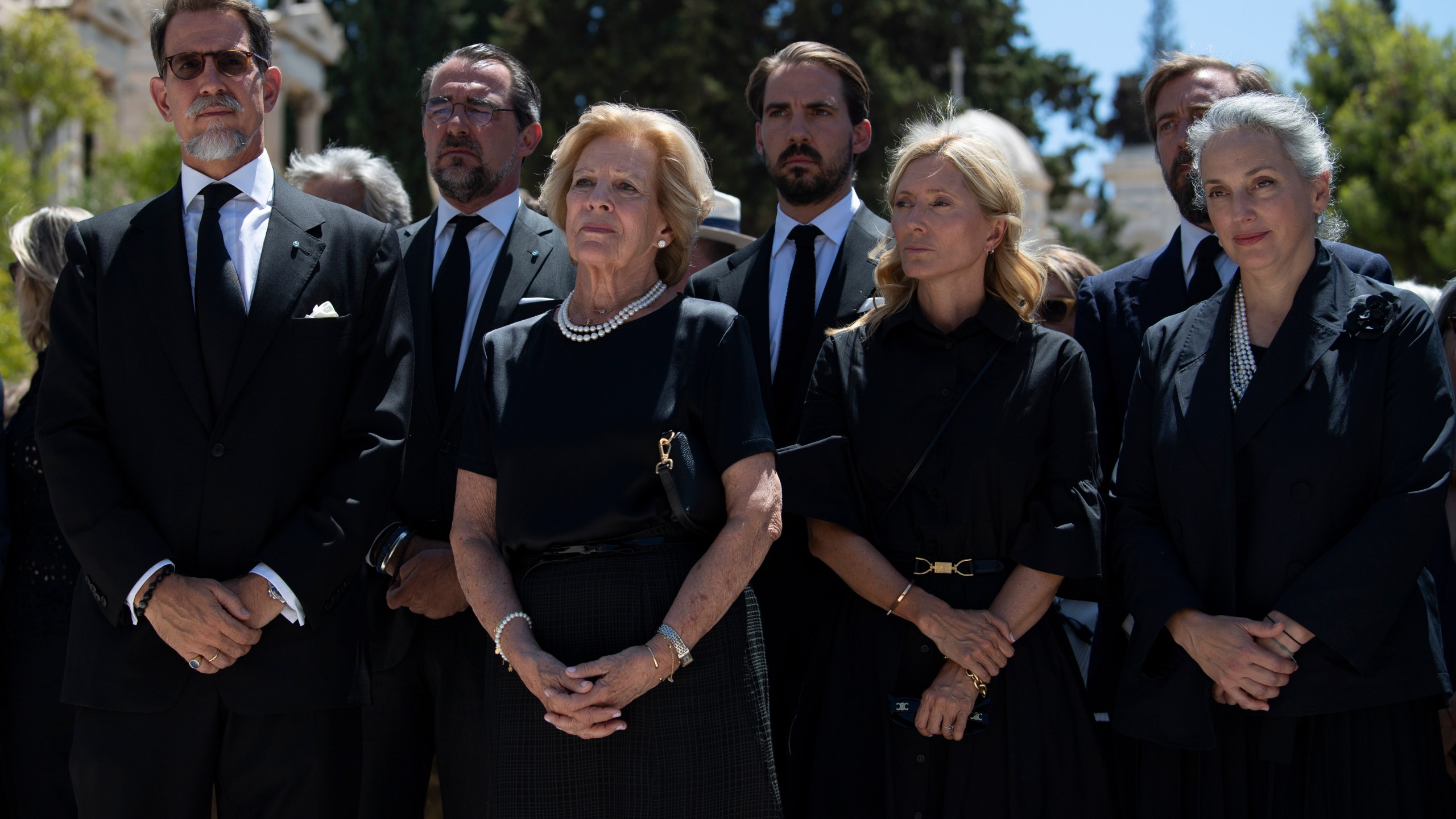 FILE - From left, Pavlos, son of former king of Greece Constantine II, Nikolaos, son of former king of Greece Constantine II, former Queen Anne-Marie of Greece, Philippos son of former king of Greece Constantine II, Marie-Chantal, wife of Pavlos, and Olga, daughter of Michael, attend the funeral of Michael, cousin of the late Prince Philip, Duke of Edinburgh, in Athens, Greece, Thursday, Aug. 1, 2024. (AP Photo/Michael Varaklas, File)