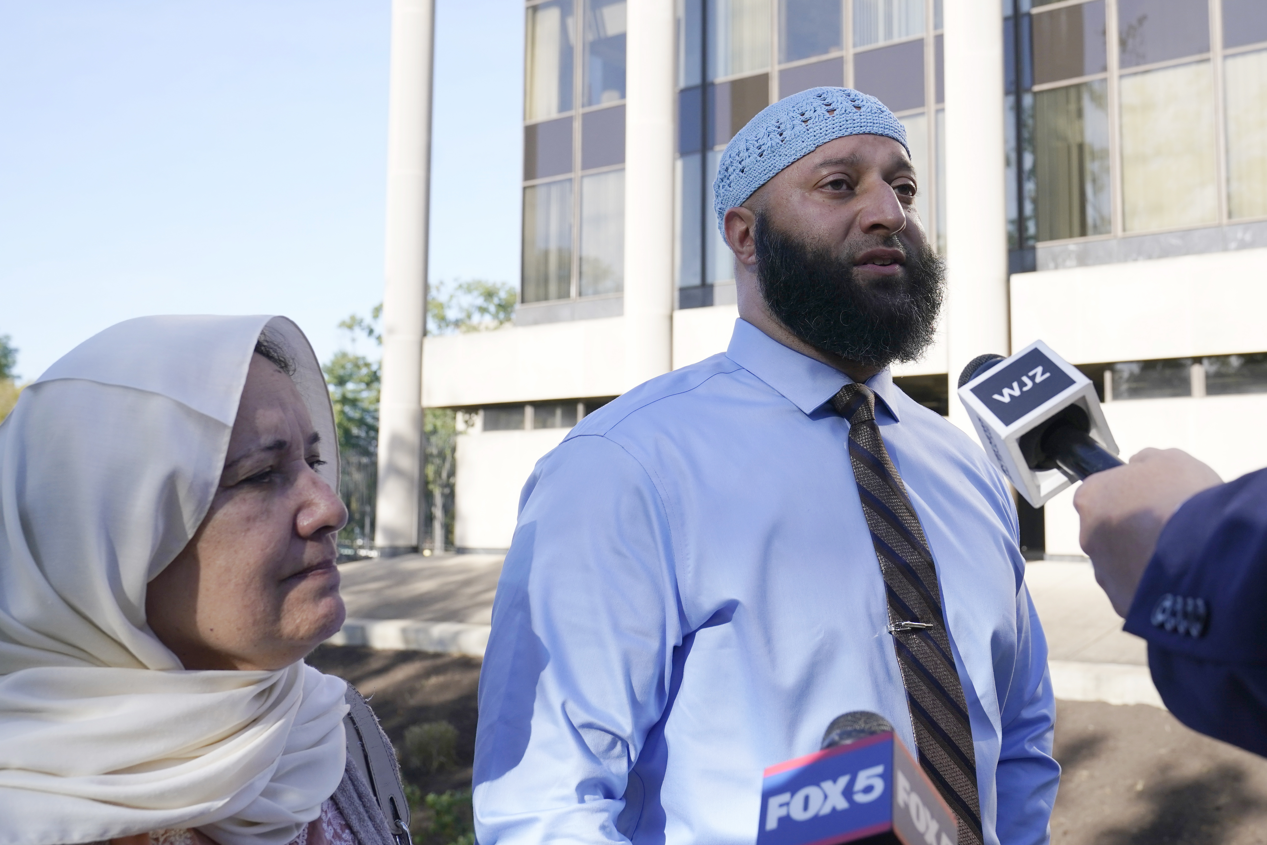 FILE - Adnan Syed and his mother, Shamim Rahman, talk with reporters as they arrive at Maryland's Supreme Court in Annapolis, Md., Thursday, Oct. 5, 2023, to hear arguments in an appeal by Syed, whose conviction for killing his ex-girlfriend more than 20 years ago was chronicled in the hit podcast "Serial." (AP Photo/Susan Walsh, File)