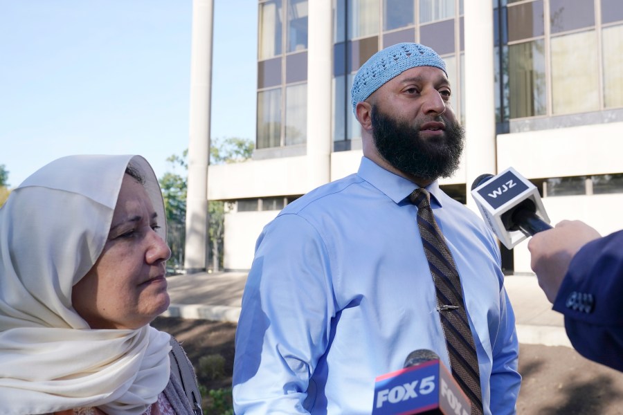 FILE - Adnan Syed and his mother, Shamim Rahman, talk with reporters as they arrive at Maryland's Supreme Court in Annapolis, Md., Thursday, Oct. 5, 2023, to hear arguments in an appeal by Syed, whose conviction for killing his ex-girlfriend more than 20 years ago was chronicled in the hit podcast "Serial." (AP Photo/Susan Walsh, File)