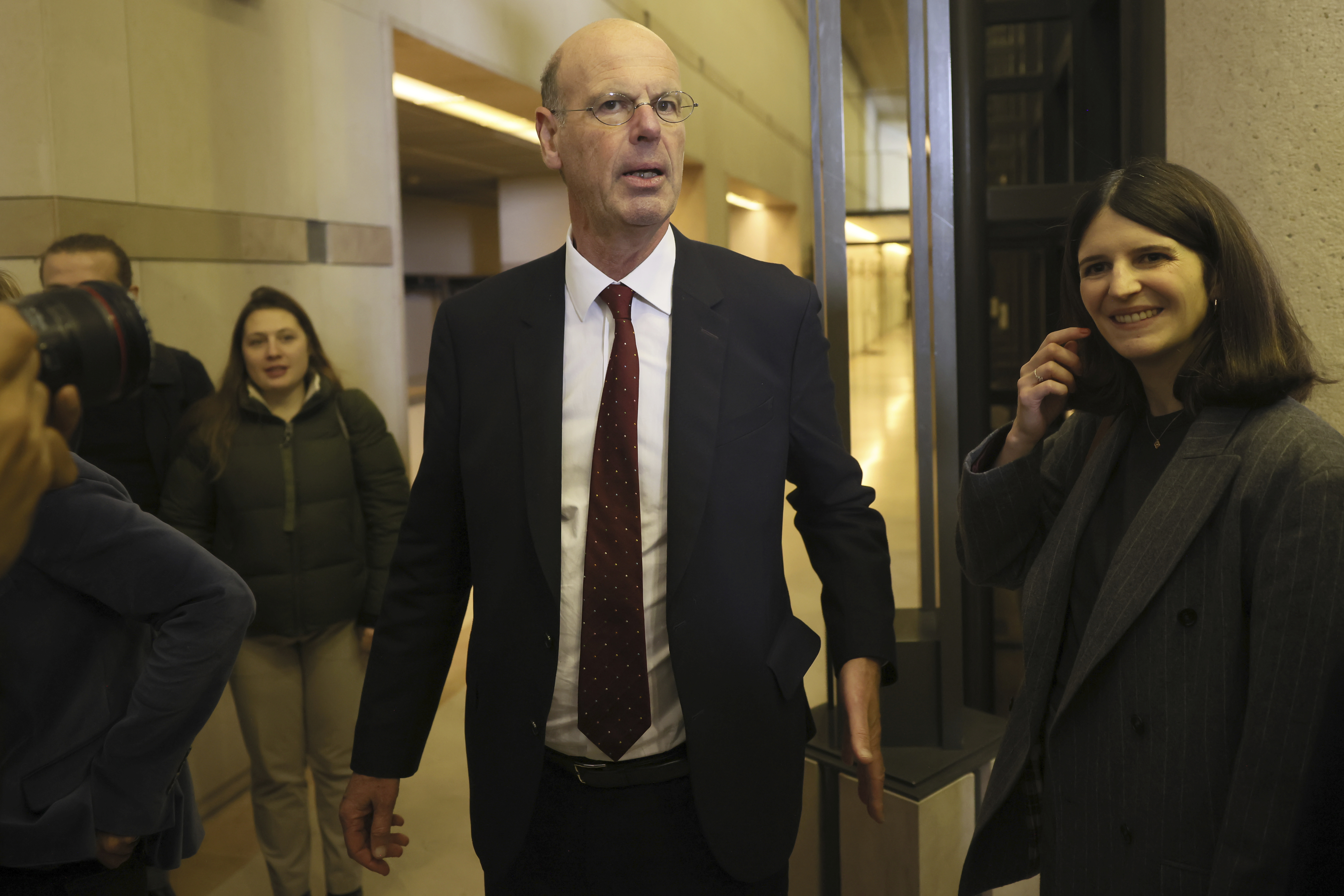 Newly named finance minister Eric Lombard leaves after the handover ceremony Monday, Dec. 23, 2024 in Paris. (AP Photo/Thomas Padilla)