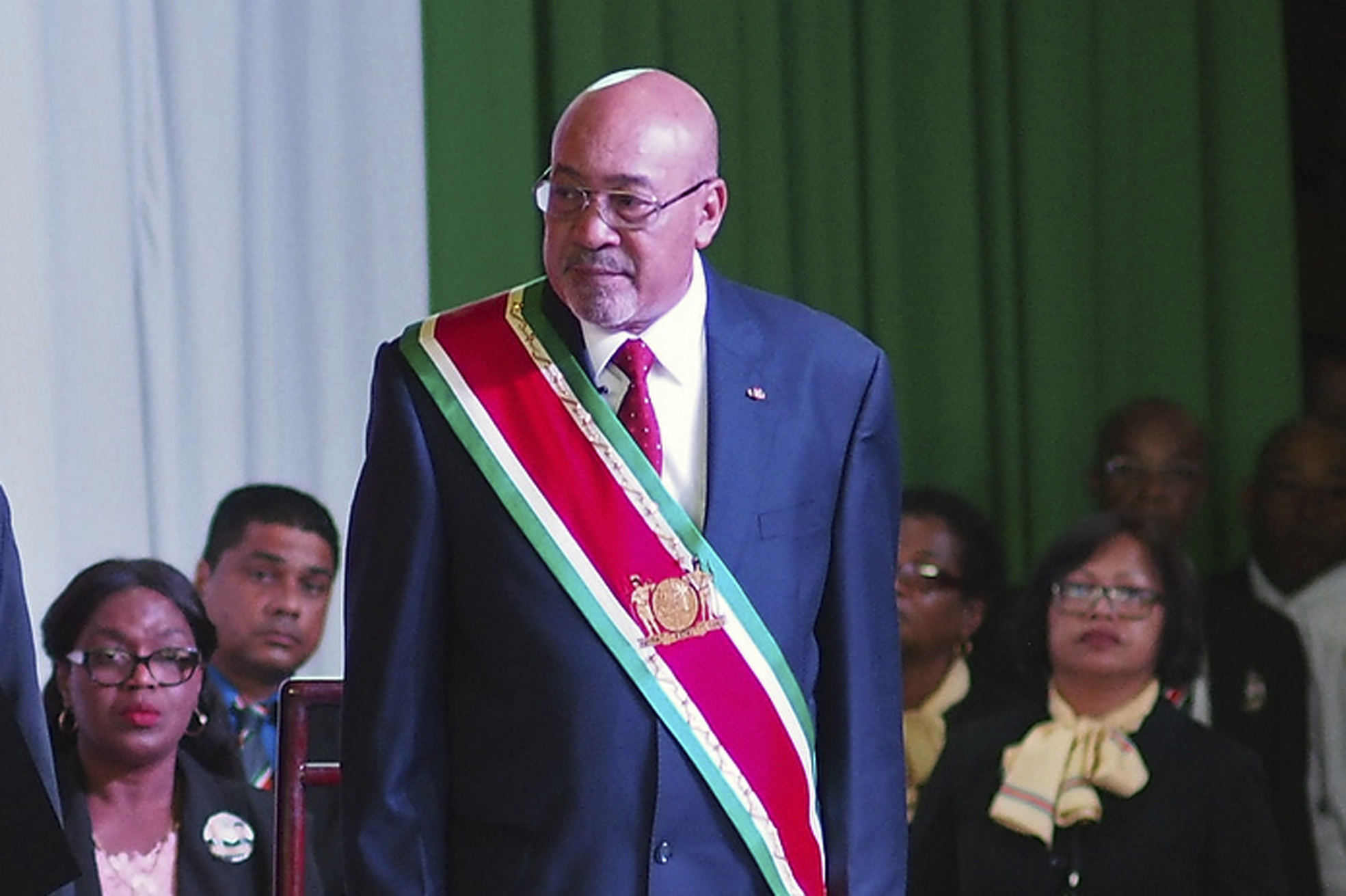 FILE - Suriname's President Desi Bouterse, re-elected to a second, five-year term, attends his swearing-in ceremony in Paramaribo, Suriname, Aug. 12, 2015. (AP Photo/Ertugrul Kilic, File)