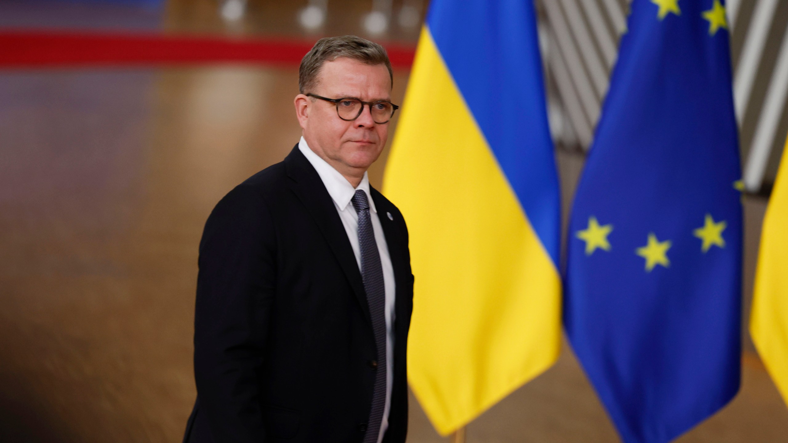 FILE - Finland's Prime Minister Petteri Orpo arrives for an EU summit at the European Council building in Brussels, Thursday, Dec. 19, 2024. (AP Photo/Geert Vanden Wijngaert, File)