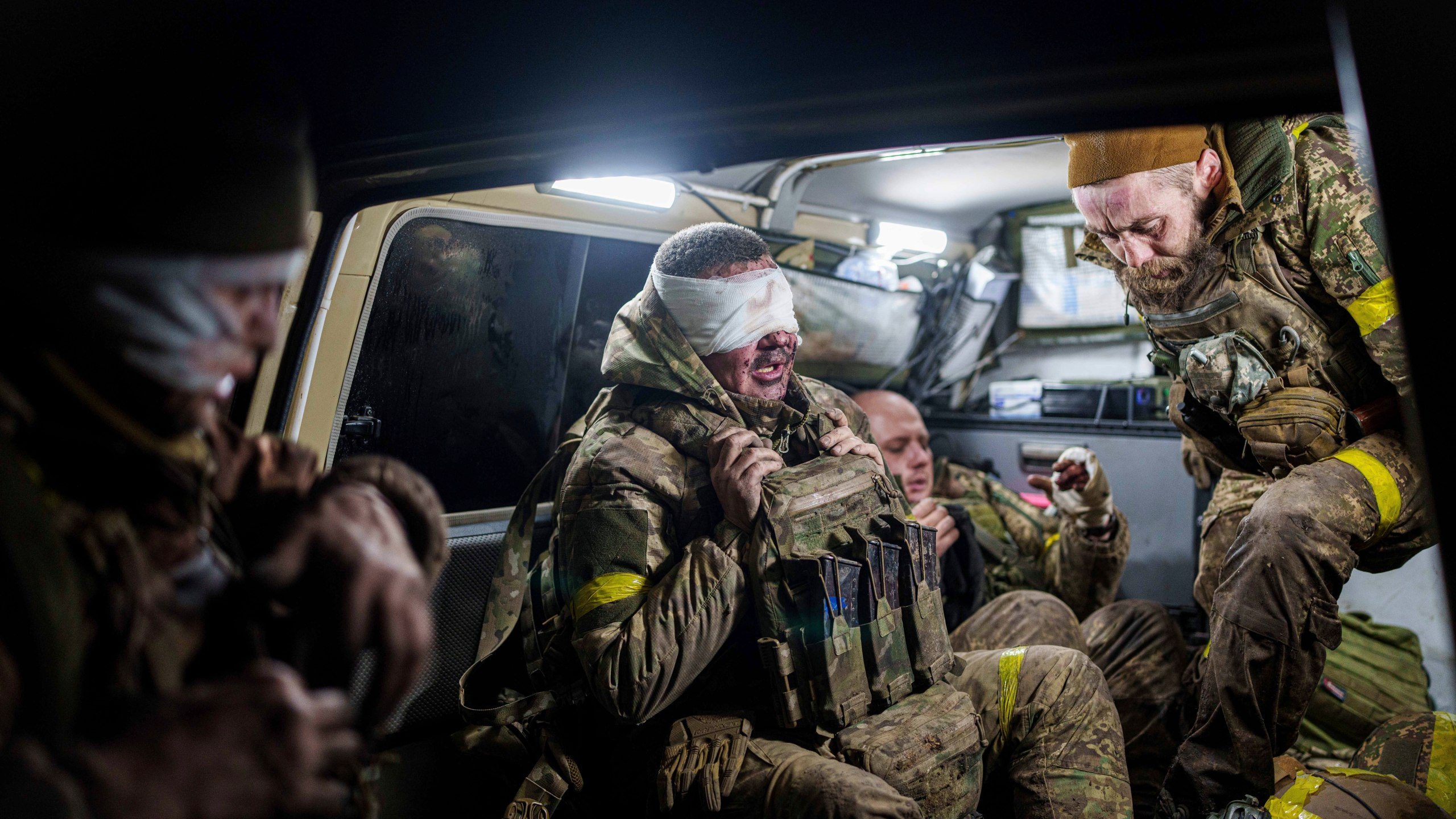 Injured Ukrainian servicemen arrive from the battlefield at Medical Service "Ulf" of the 108th Separate Battalion "Da Vinci Wolves" on Pokrovsk direction, Ukraine, Monday, Dec. 23, 2024. (AP Photo/Evgeniy Maloletka)