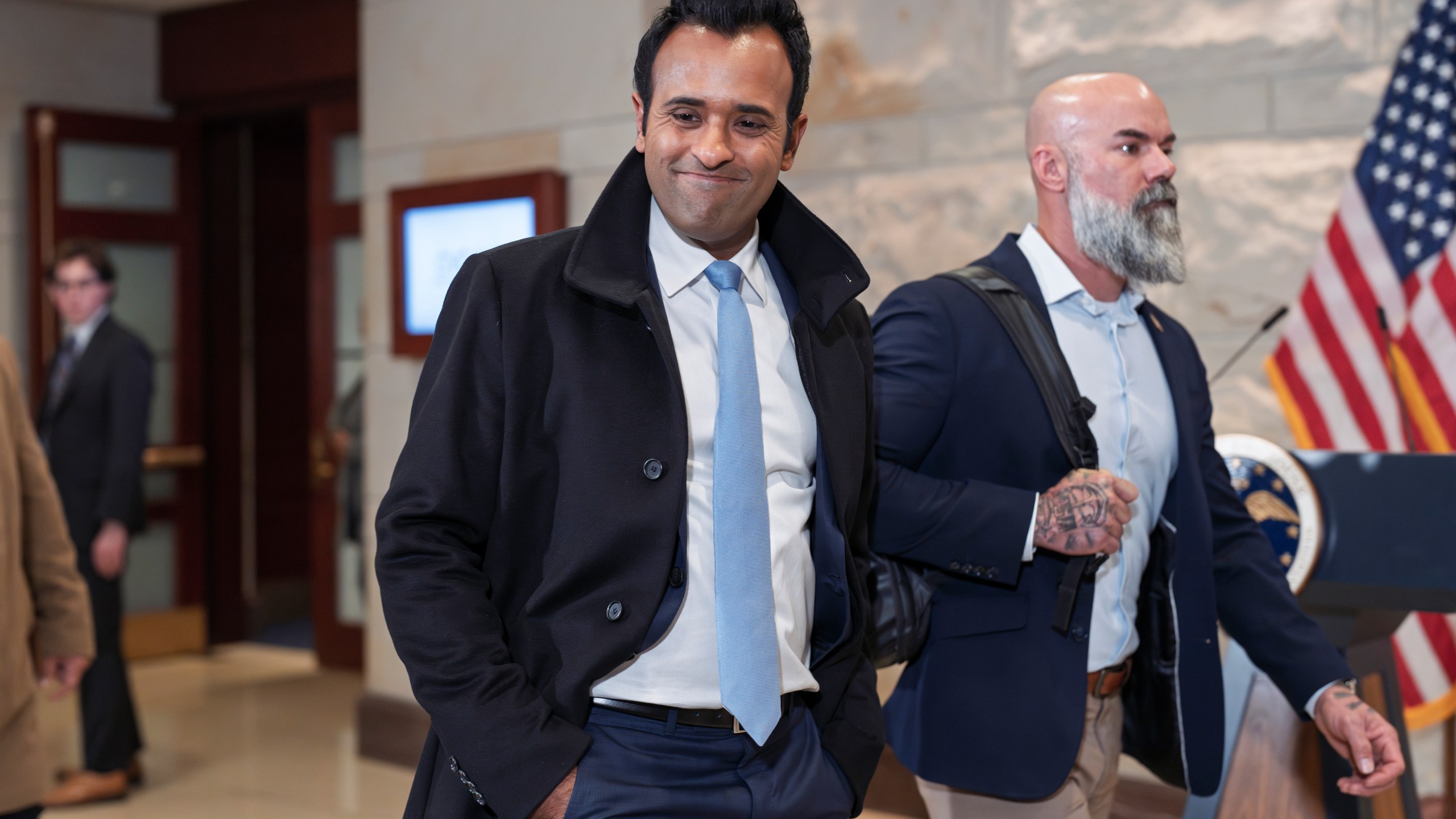 Vivek Ramaswamy arrives at the Capitol in Washington, Thursday, Dec. 5, 2024, to meet with Speaker of the House Mike Johnson, R-La., and billionaire Elon Musk as they convene a meeting of the unofficial Department of Government Efficiency, or DOGE, as envisioned by President-elect Donald Trump. (AP Photo/J. Scott Applewhite)