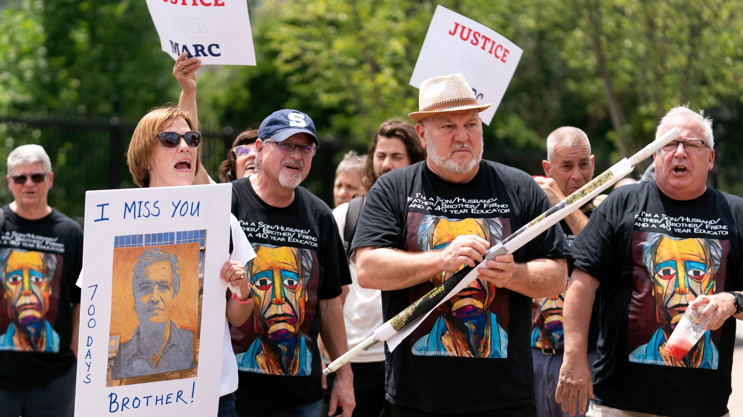 FILE - Lisa Hyland, left, and other family members of Marc Fogel, who has been detained in Russia since August 2021, rally outside the White House for his release, July 15, 2023, in Washington. (AP Photo/Stephanie Scarbrough, File)