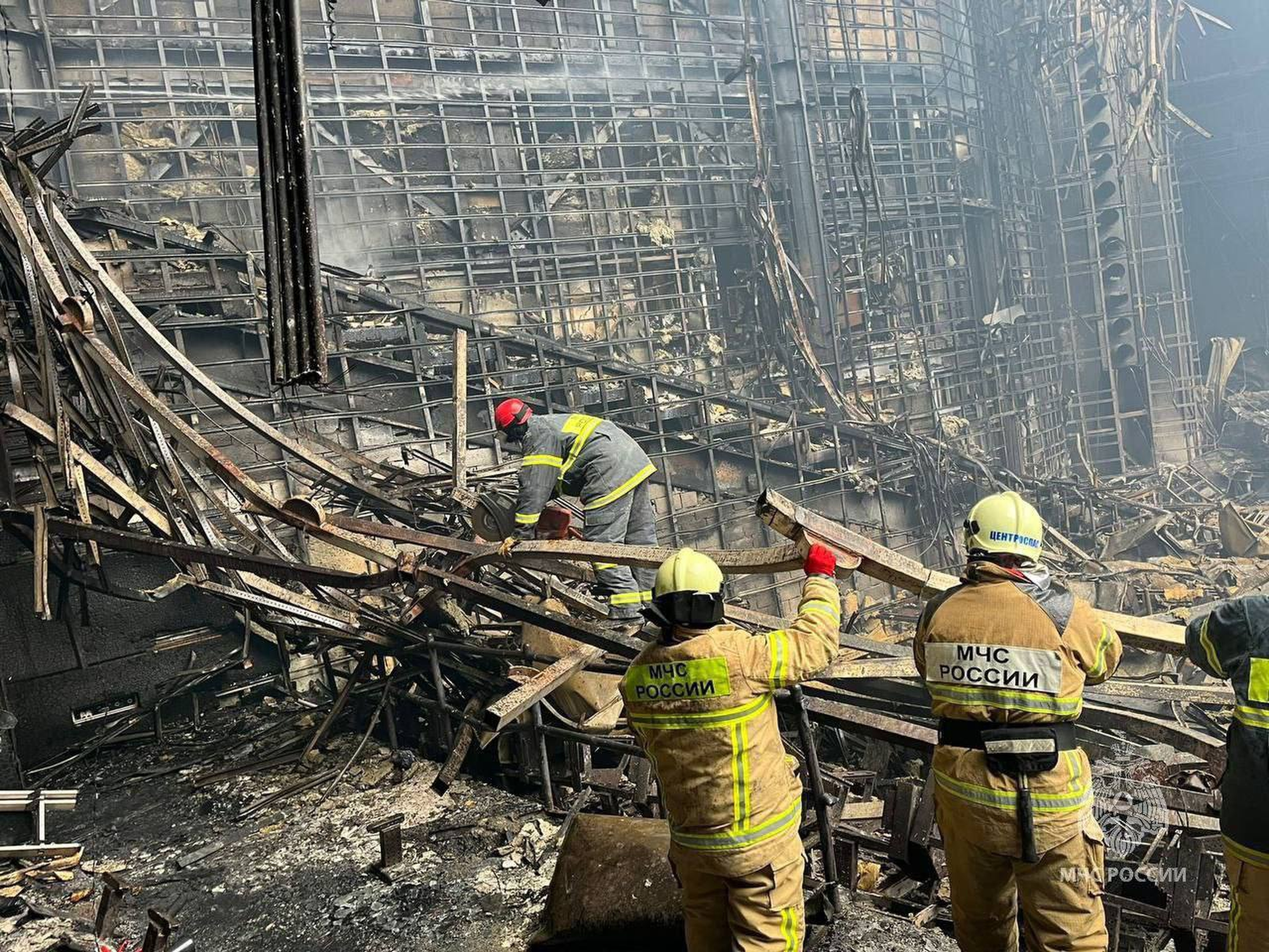 FILE - In this photo released by the Russian Emergency Ministry Press Service, rescuers work at Crocus City Hall on the western edge of Moscow, on March 23, 2024, following an attack. (Russian Emergency Ministry Press Service via AP, File)