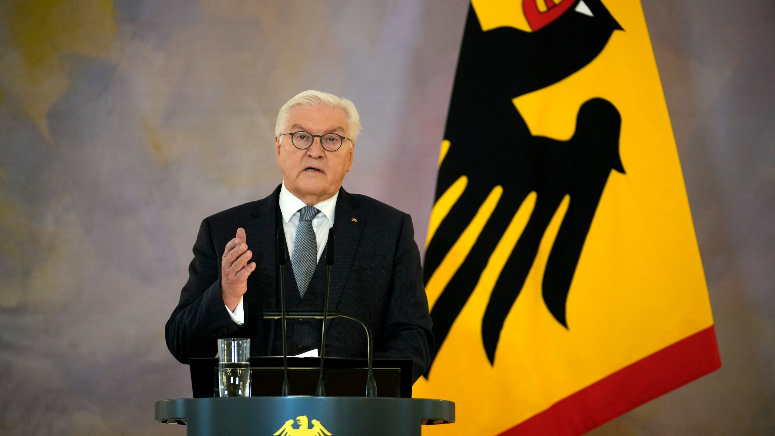 German President Frank-Walter Steinmeier announces the decision to dissolve the German Bundestag and schedule a new election for February 23 next year, in Berlin, Friday, Dec. 27, 2024. (AP Photo/Ebrahim Noroozi)