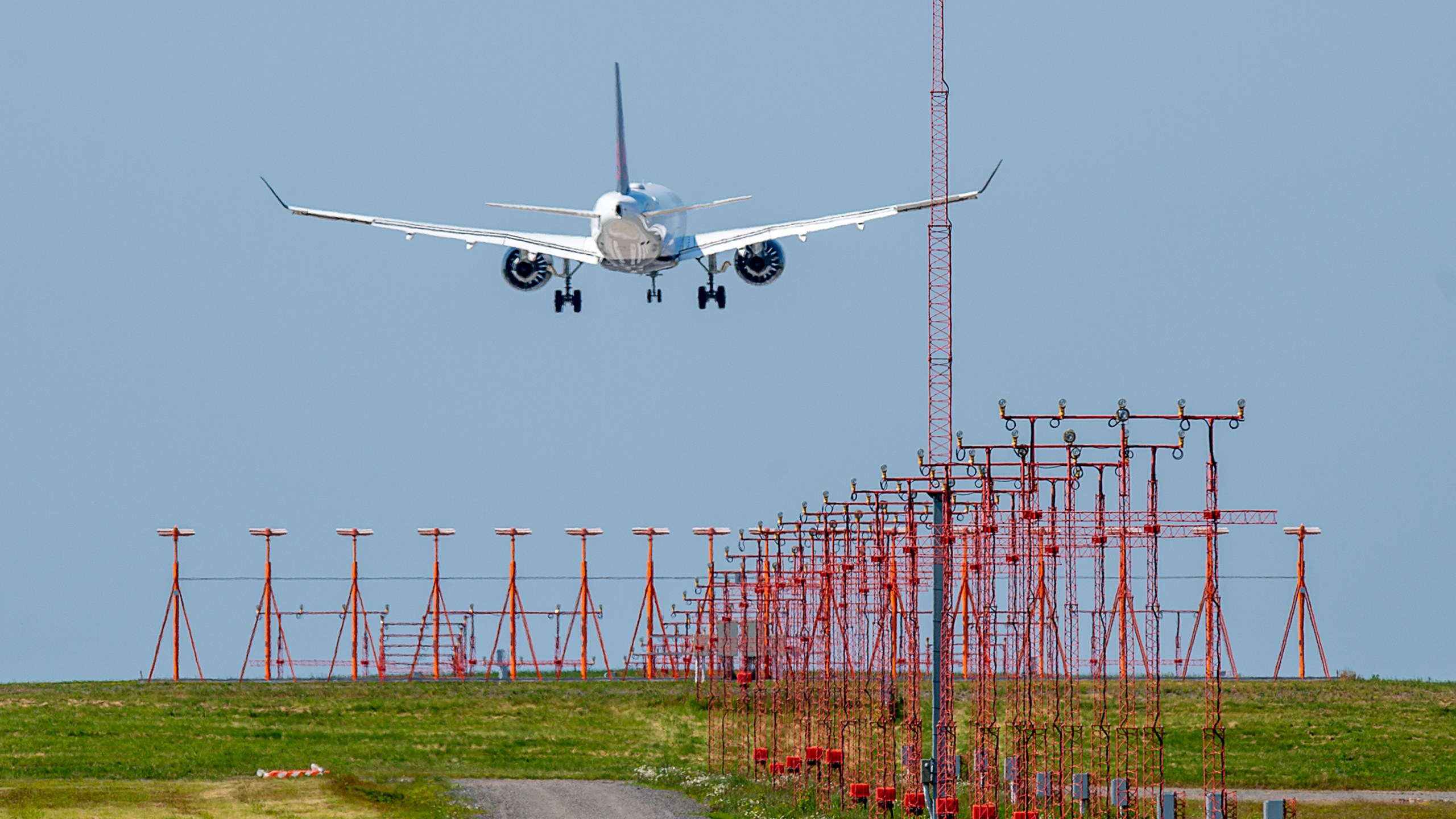 An airliner arrives at Halifax Stanfield International Airport in Enfield, N.S. on Monday, June 28, 2021. (Andrew Vaughan/The Canadian Press via AP)