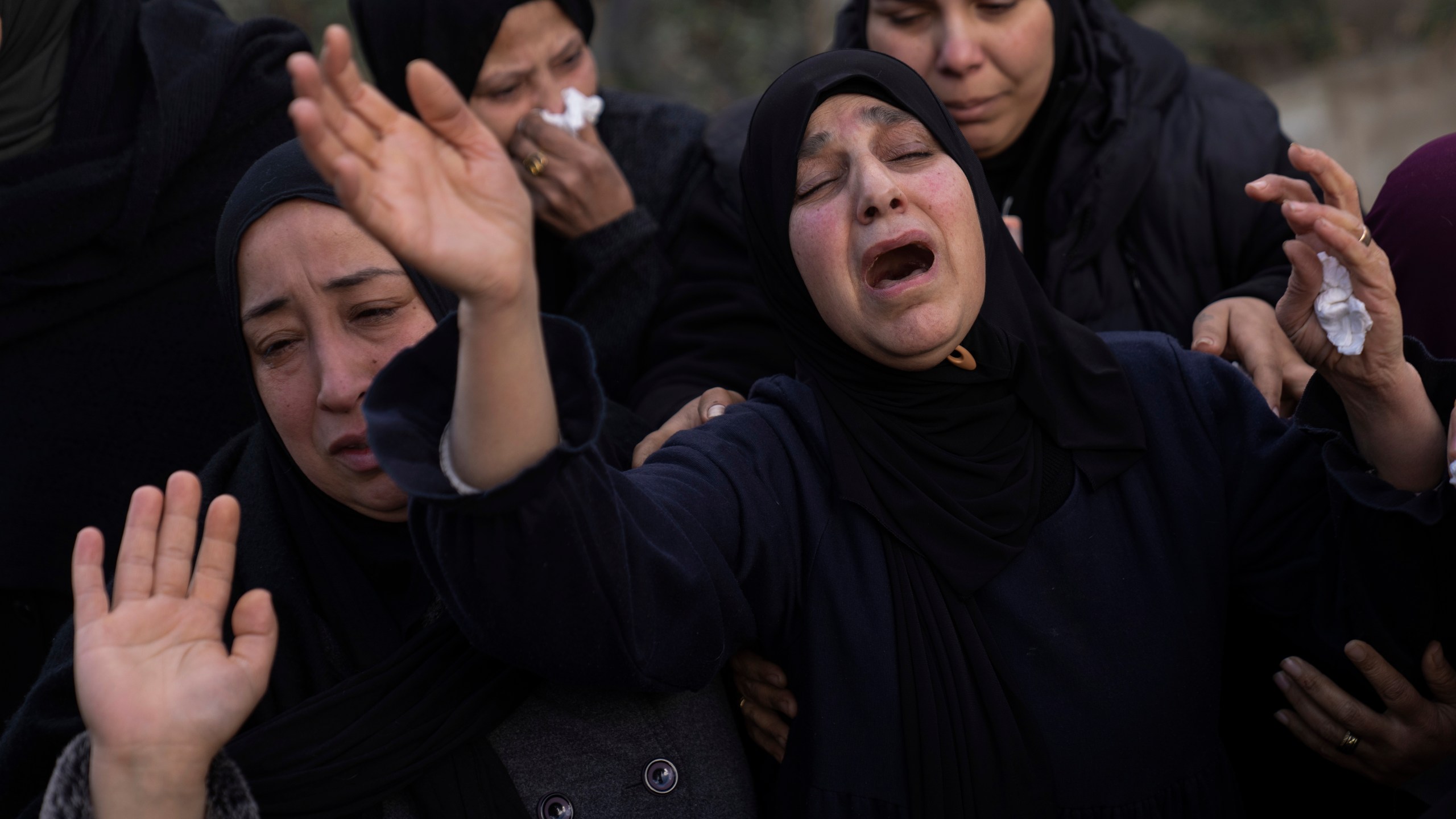 Relatives mourn the death of Palestinian Shatha al-Sabbagh, a 22-year-old journalism student, during her funeral in the Jenin refugee camp in the Israeli-occupied West Bank, Sunday, Dec. 29, 2024. (AP Photo/Majdi Mohammed)