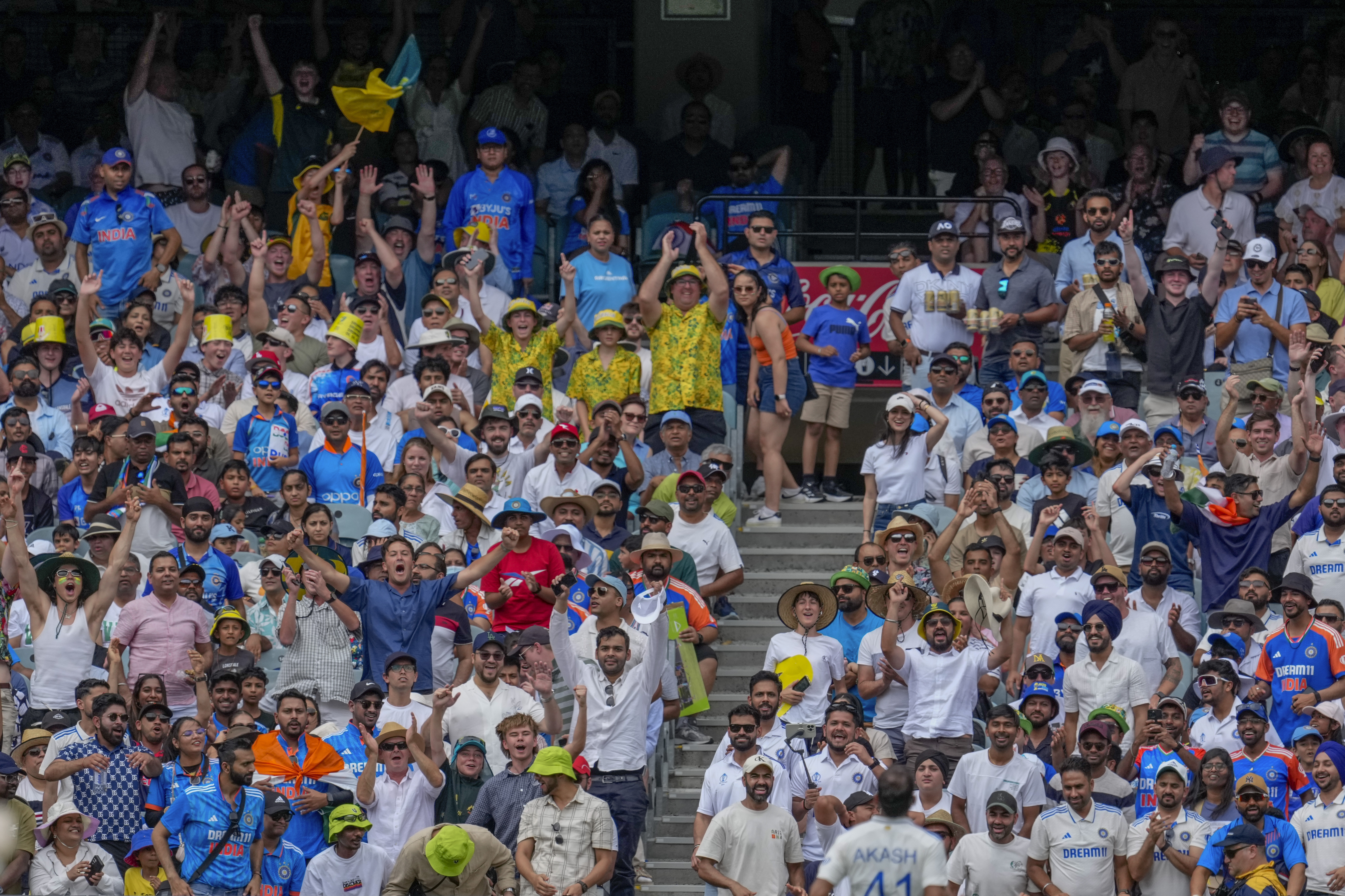 FILE - The crowd reacts after Australia's Sam Konstas hits a six during play on the first day of the fourth cricket test between Australia and India at the Melbourne Cricket Ground, Melbourne, Australia, Thursday, Dec. 26, 2024. (AP Photo/Asanka Brendon Ratnayake, file)