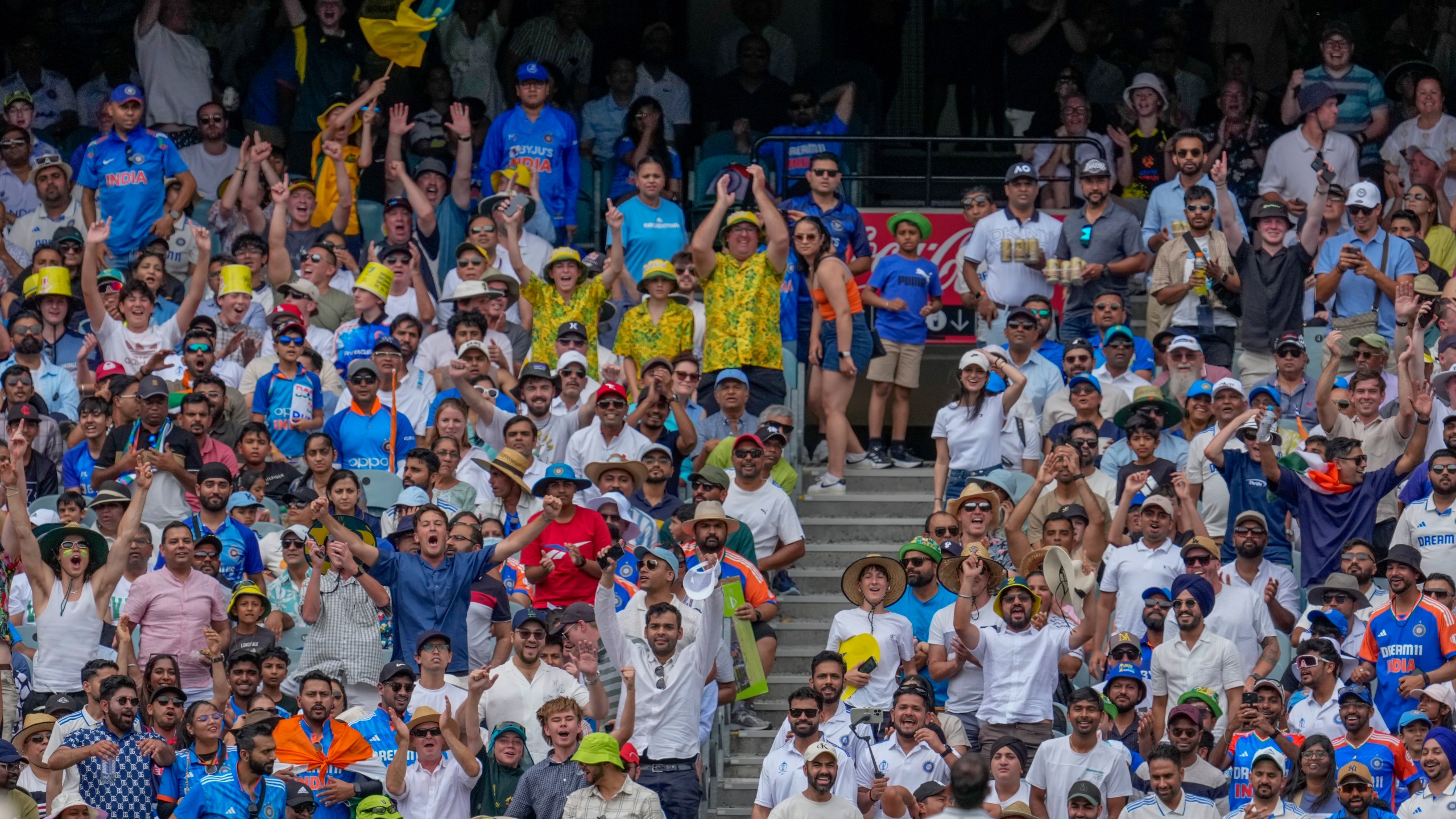 FILE - The crowd reacts after Australia's Sam Konstas hits a six during play on the first day of the fourth cricket test between Australia and India at the Melbourne Cricket Ground, Melbourne, Australia, Thursday, Dec. 26, 2024. (AP Photo/Asanka Brendon Ratnayake, file)