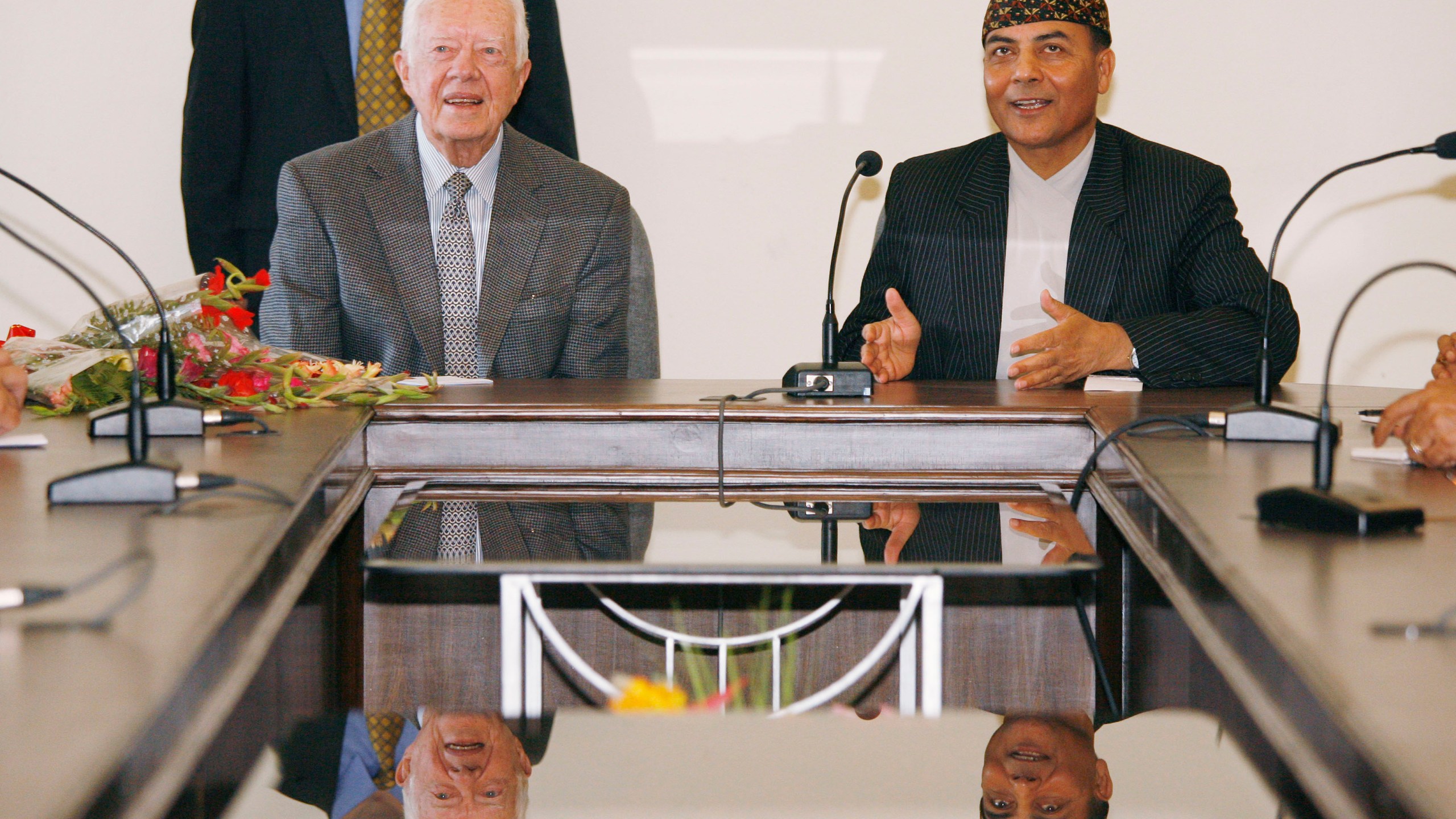 FILE - Former U.S. President Jimmy Carter meets with Bhoj Raj Pokhrel, Nepal's chief election official, on April 8, 2008, in Katmandu, Nepal. (AP Photo/Ed Wray, File)