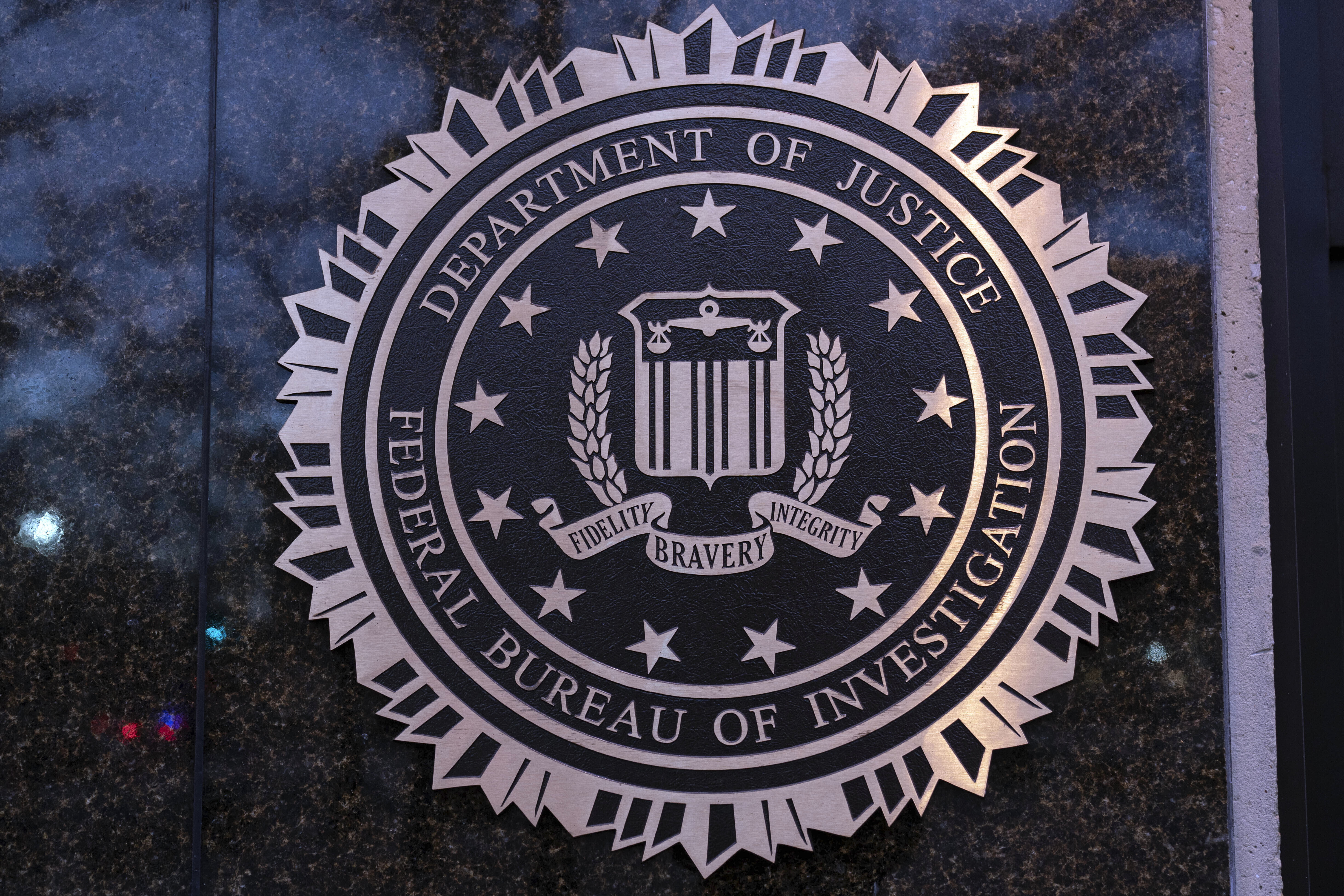 FILE - The seal of theFederal Bureau of Investigation (FBI) is seen on the Headquarters in Washington, Saturday, Dec. 7, 2024. (AP Photo/Jose Luis Magana, File)