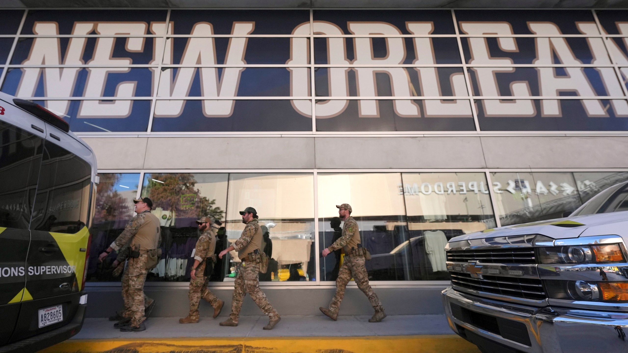 FBI SWAT team members arrive at the Superdome before the quarterfinals of a College Football Playoff between Georgia and Notre Dame, Thursday, Jan. 2, 2025, in New Orleans. (AP Photo/Gerald Herbert)