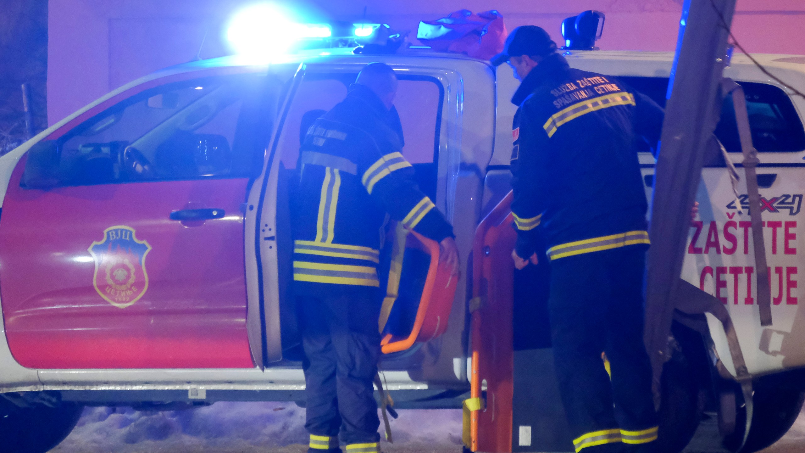 Rescue workers work at the site of a shooting in Cetinje, 36 kilometers (22 miles) west of Podogrica, Montenegro, Wednesday, Jan 1, 2025. (AP Photo/Risto Bozovic)