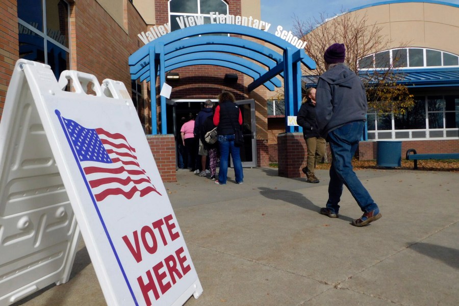 FILE - Pennigton County voters head to the polls at Valley View Elementary School Gym on Election Day, on Nov. 5, 2024, in Rapid City, S.D. (Madison Willis/Rapid City Journal via AP, File)