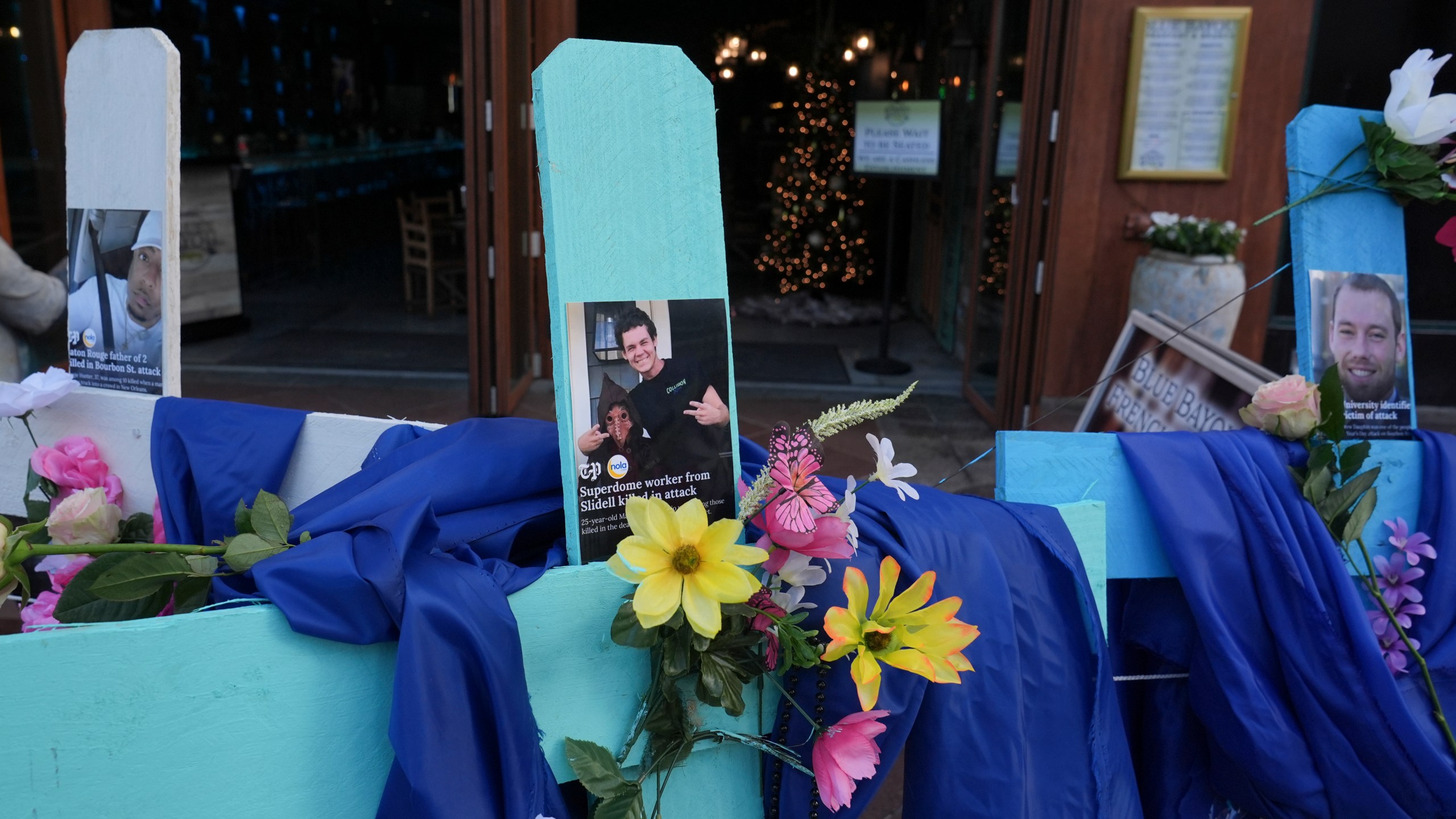 A memorial to the victims of a deadly truck attack is seen on Canal Street in the French Quarter, Friday, Jan. 3, 2025, in New Orleans. (AP Photo/George Walker IV)