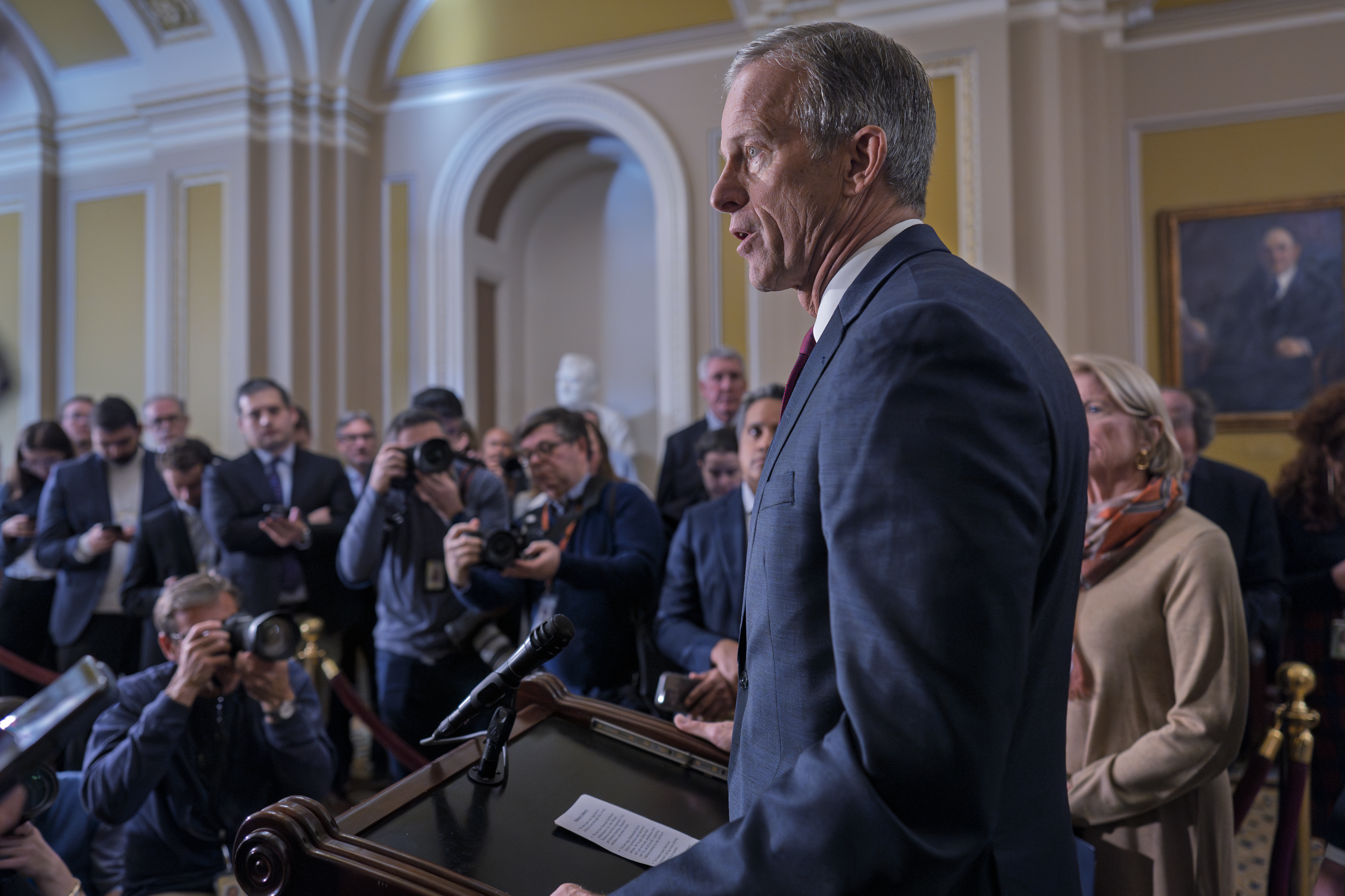 Senate Minority Whip John Thune, R-S.D., speaks to reporters following a closed-door strategy session, at the Capitol in Washington, Tuesday, Dec. 17, 2024. (AP Photo/J. Scott Applewhite)