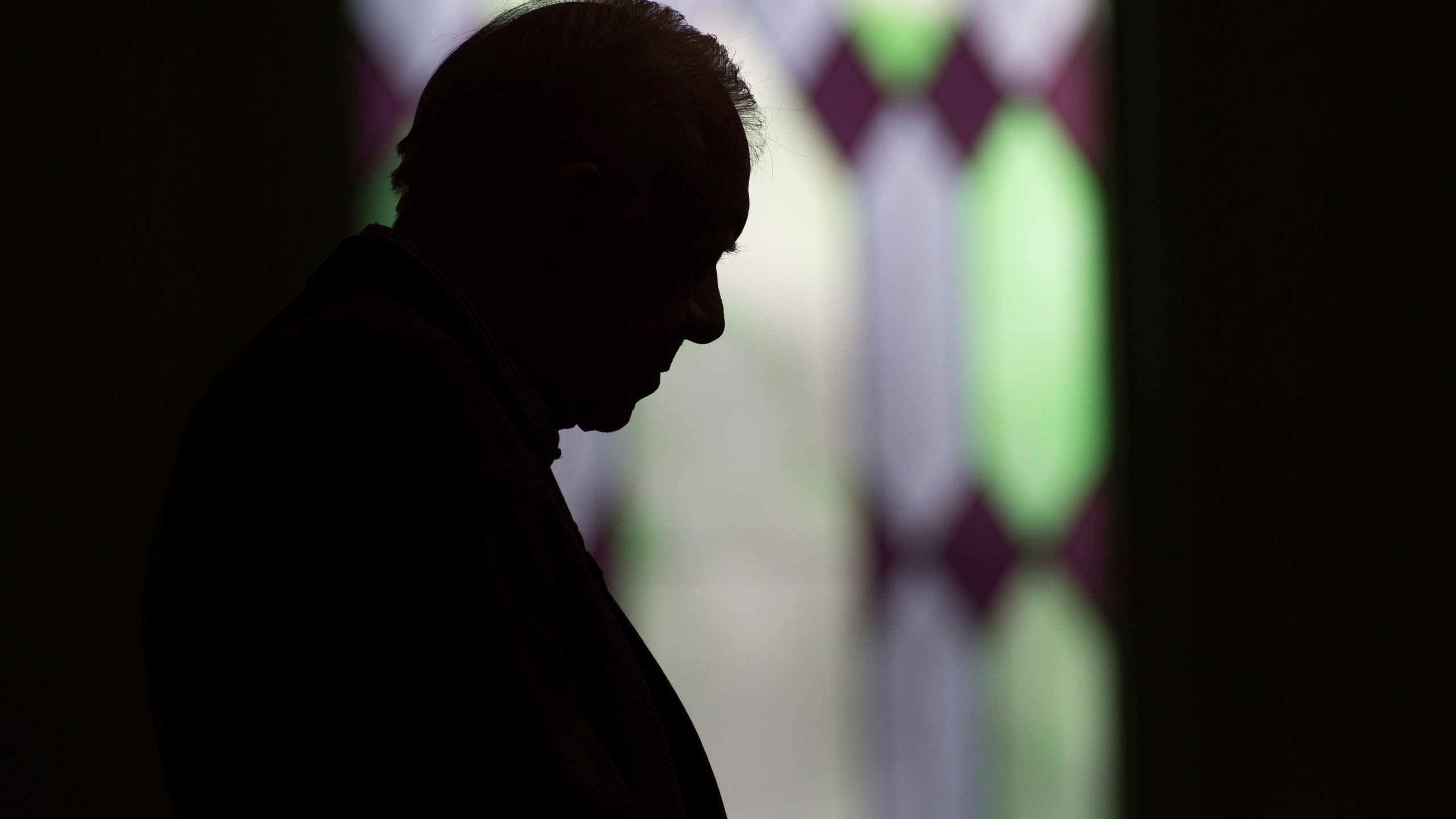 FILE - Former President Jimmy Carter prays during Sunday school class at Maranatha Baptist Church in his hometown, Dec. 13, 2015, in Plains, Ga. (AP Photo/Branden Camp, File)