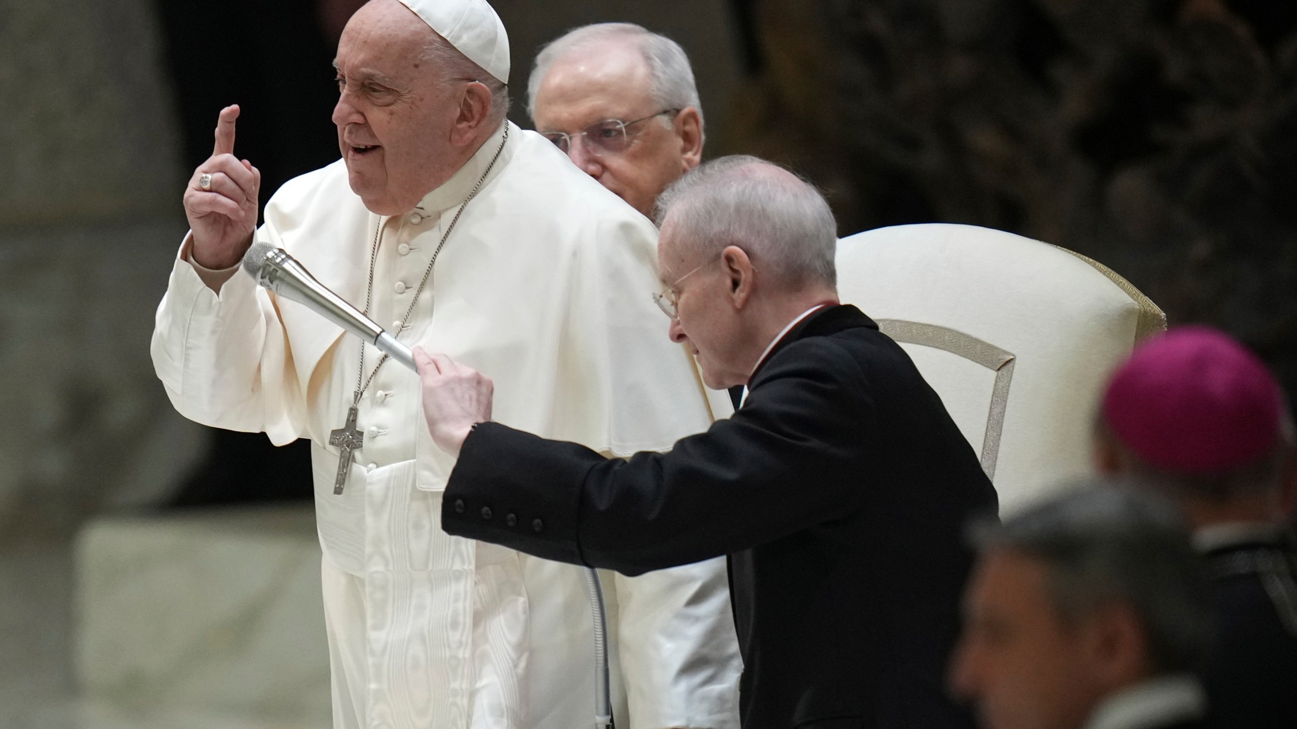 Pope Francis gestures during an audience with Catholic associations of teachers and students' parents in the Paul VI Hall, at the Vatican, Saturday, Jan. 4, 2025. (AP Photo/Alessandra Tarantino)