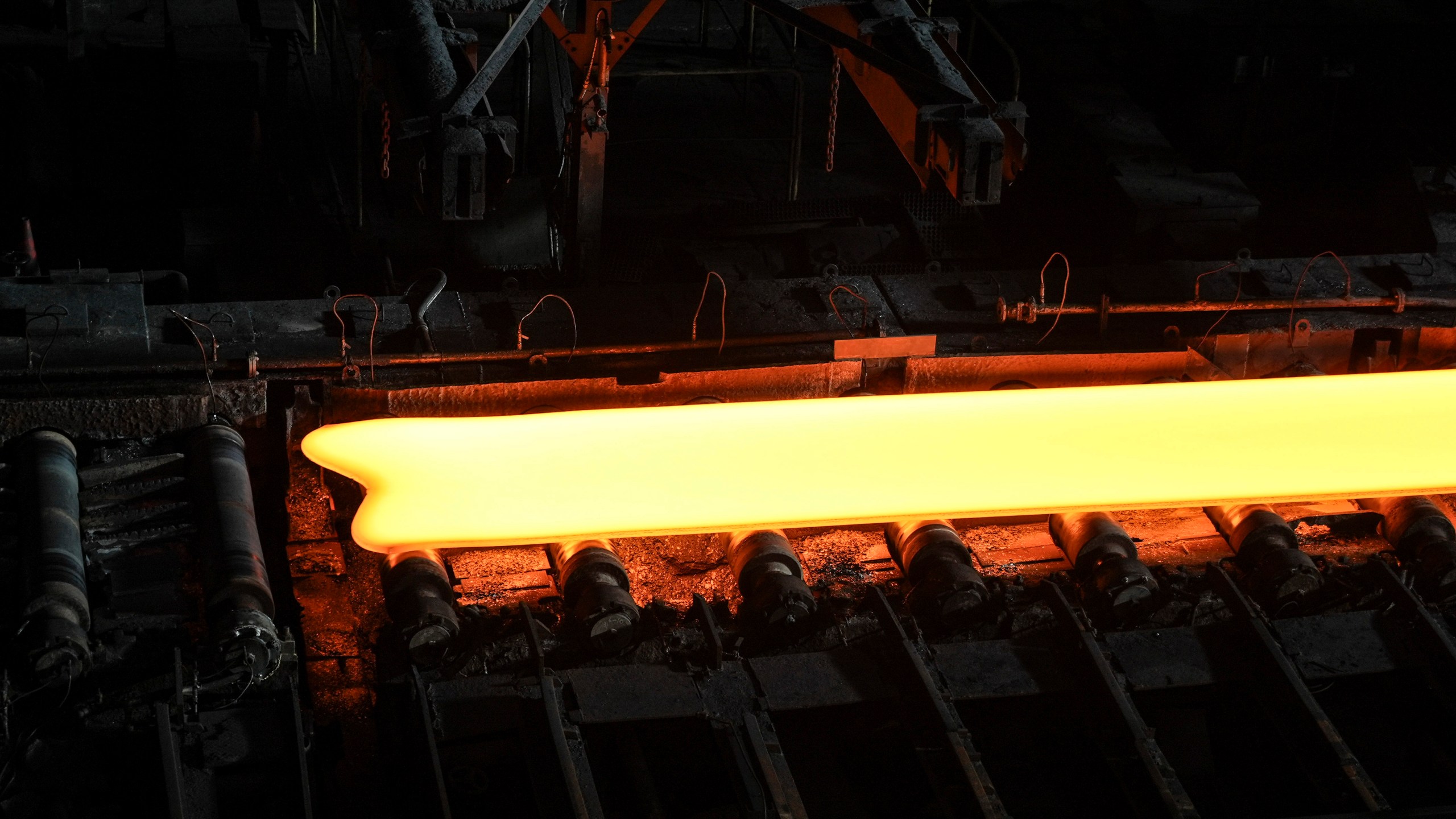 A slab of steel on a hot rolling mill at Nippon Steel's Kashima Plant in Kashima, Japan on Friday, Dec.6, 2024. (AP Photo/Ayaka McGill)